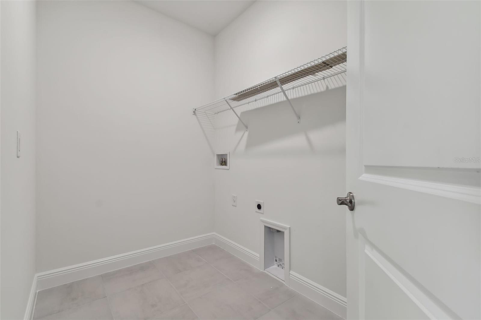 Photos are not the home listed, but same floor plan.