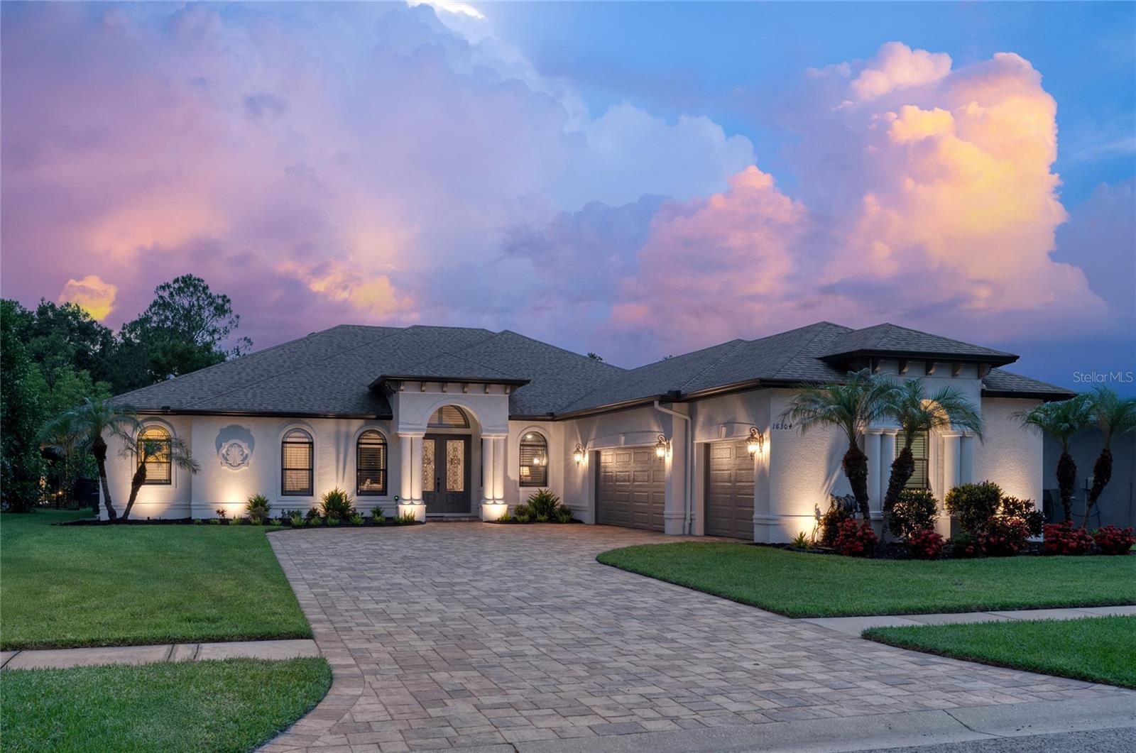 This 2015 Larson built home has oversized bedrooms, 10 ft ceilings, 8 ft doors throughout and so much storage.