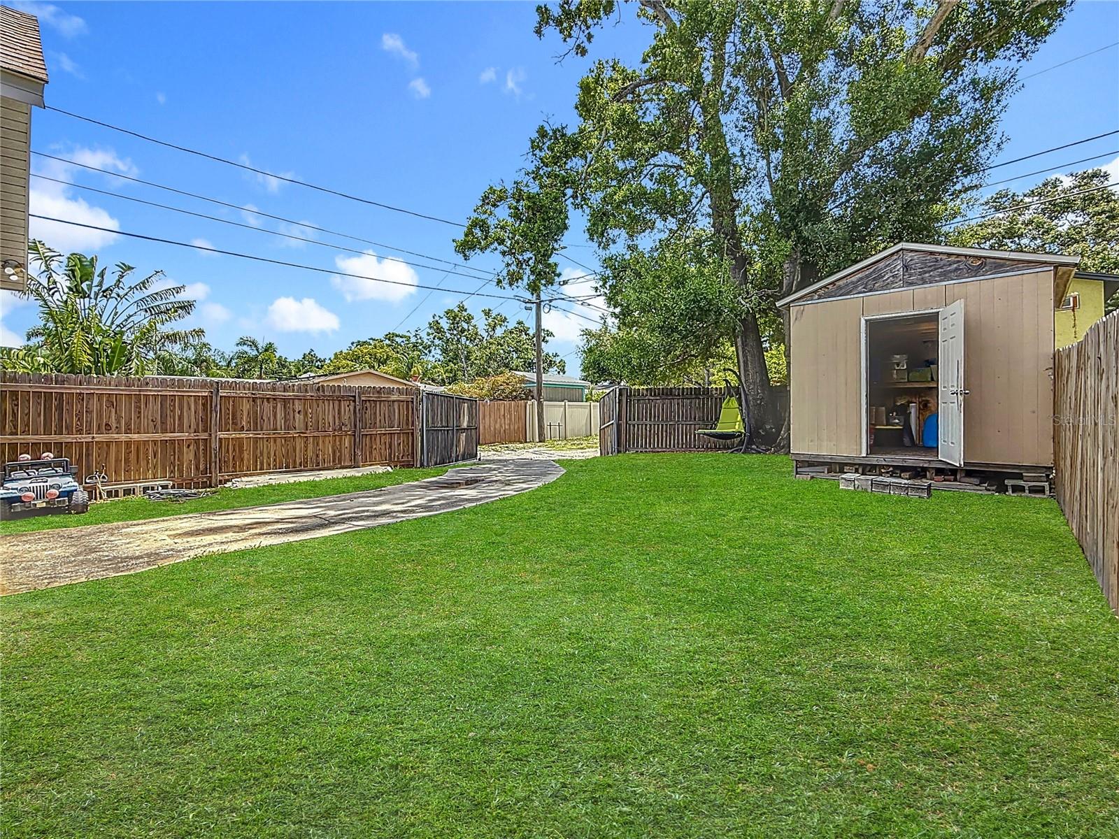 Backyard and double gate with alley access