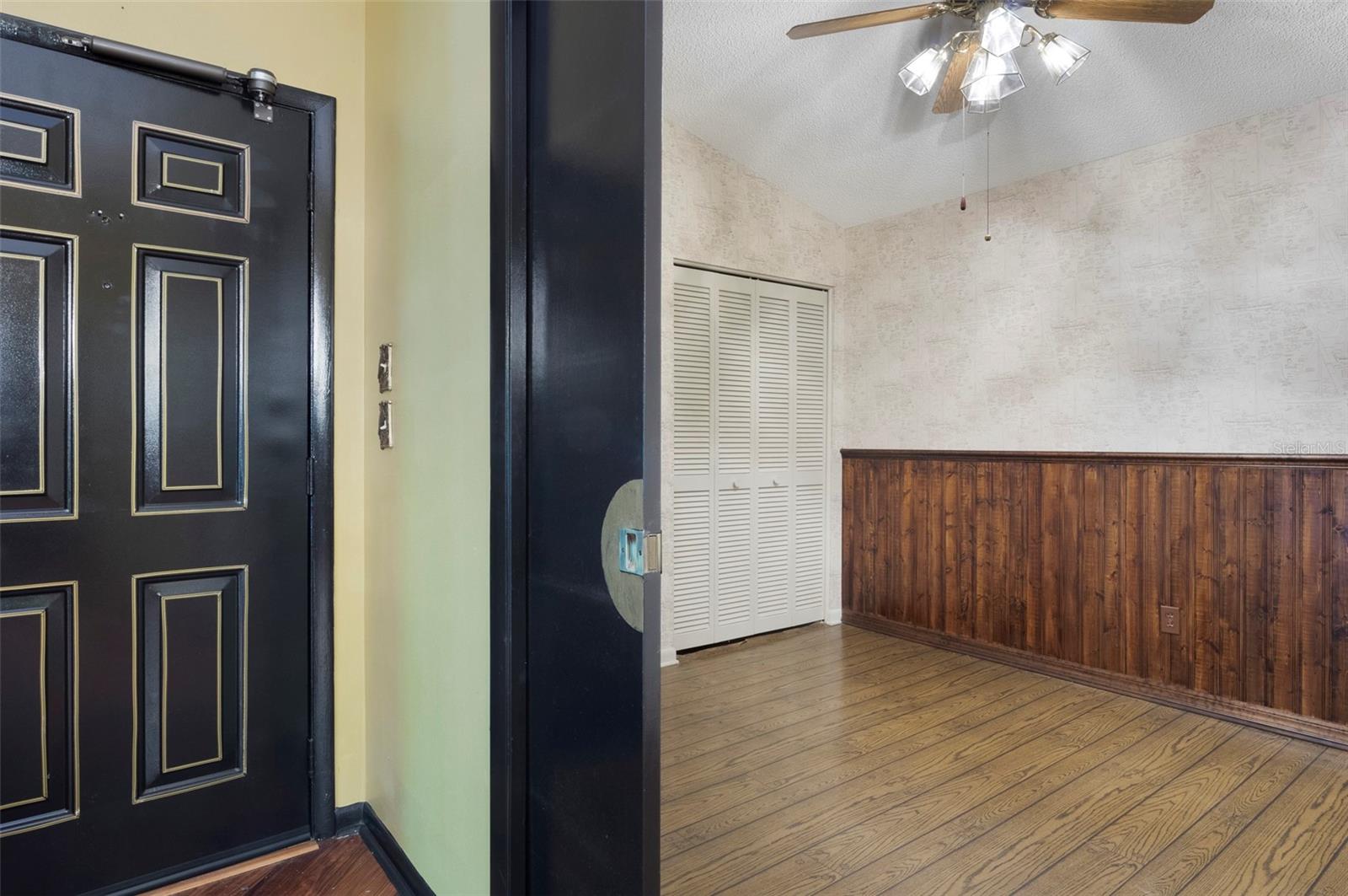 The bedroom off the entrance could also serve as an office.