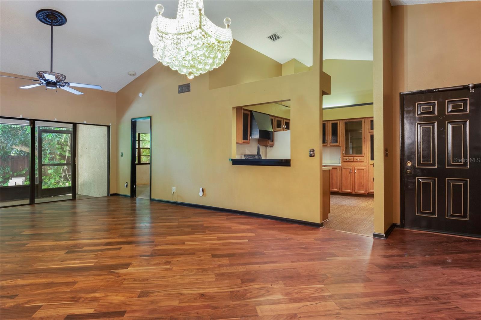 Beautiful Vaulted Ceilings! Look at the engineered hardwood flooring.