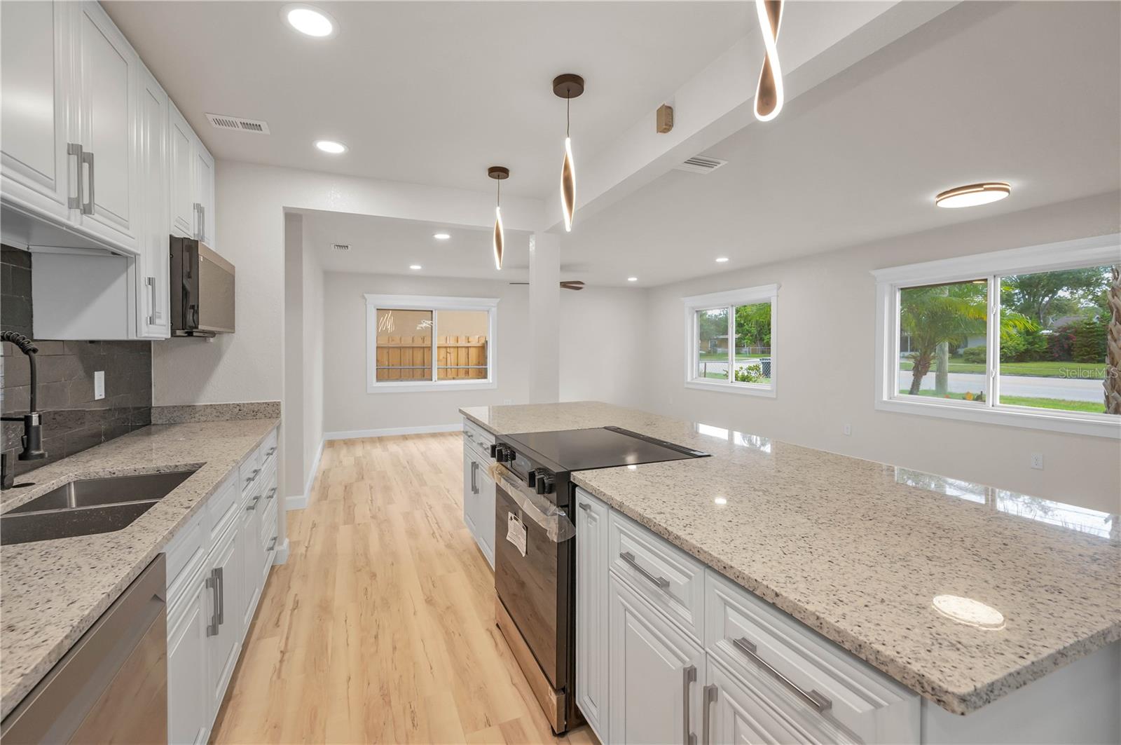 View from kitchen and great room to outdoors