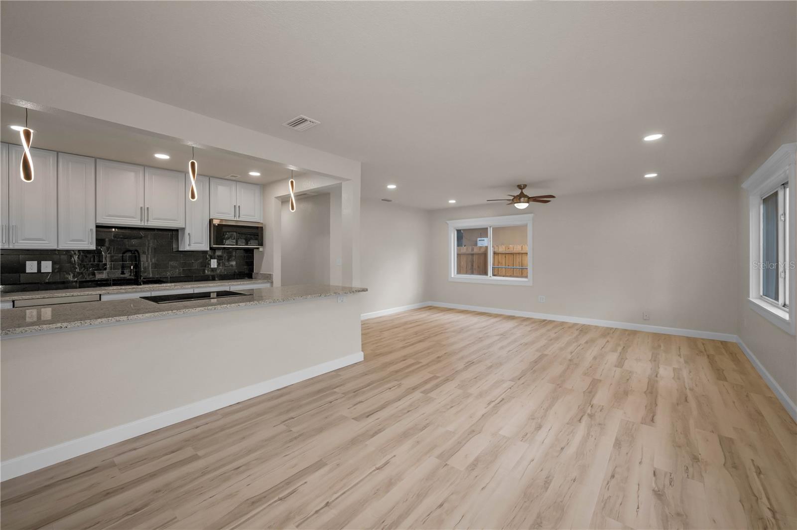 Front entry into great room and open kitchen