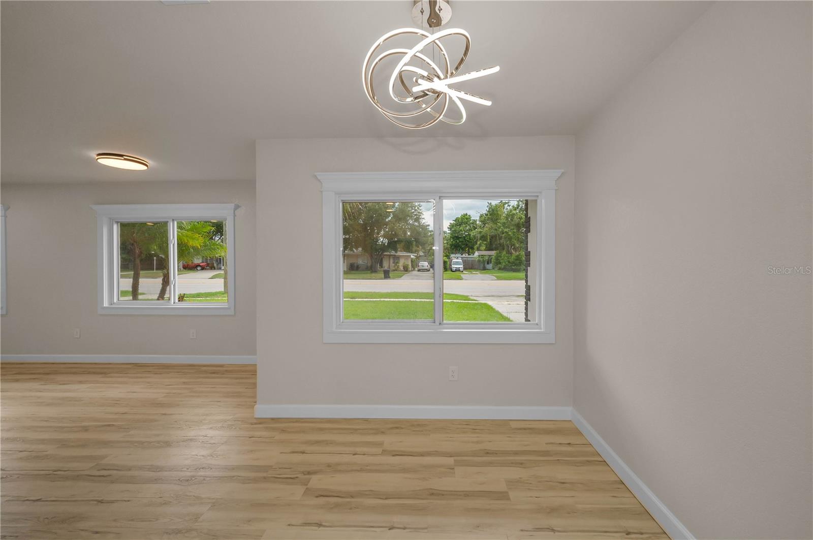 View from dining room and great room to front yard