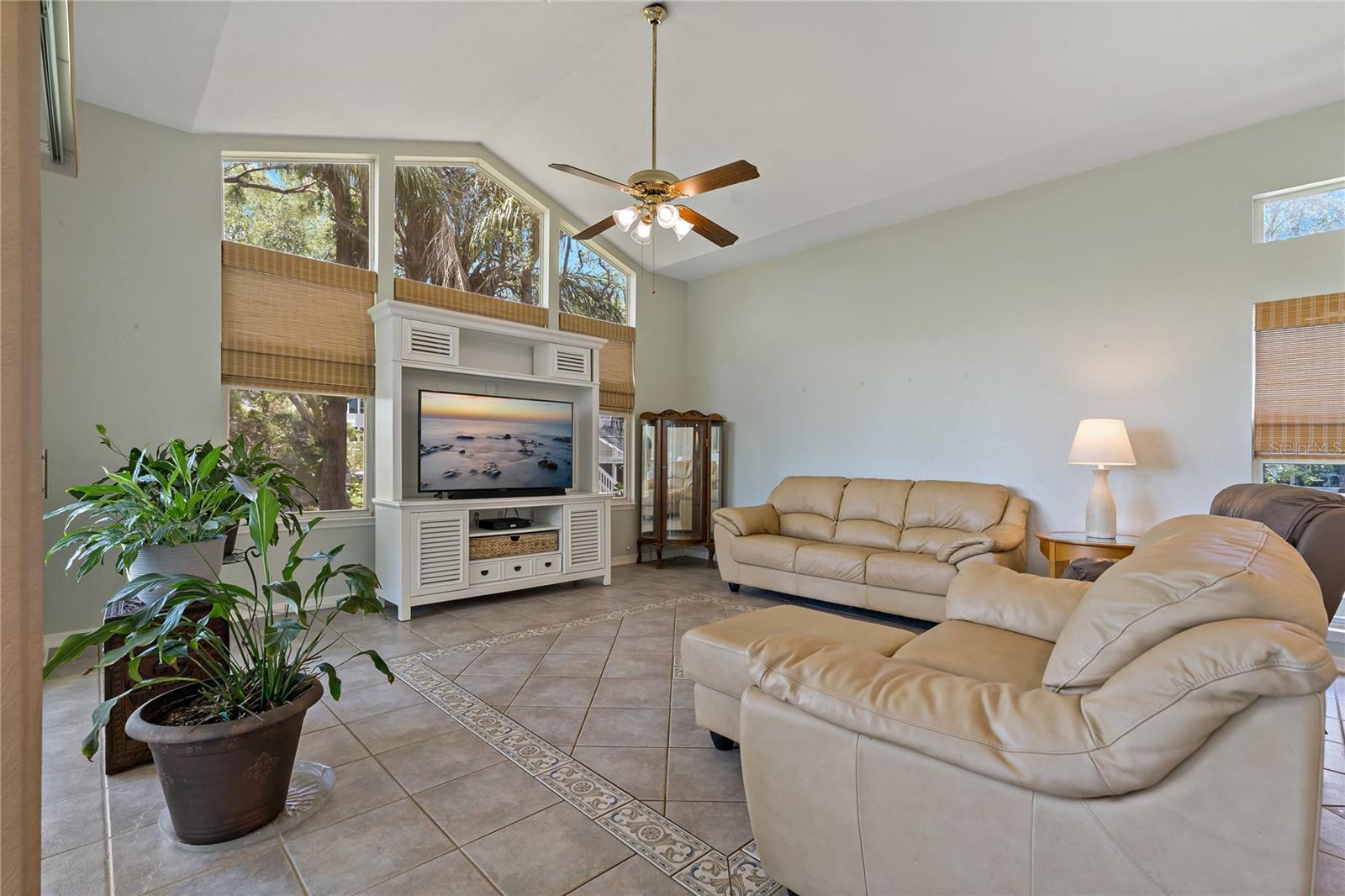 TONS OF NATURAL LIGHT BEAMS INTO THE FAMILY ROOM!