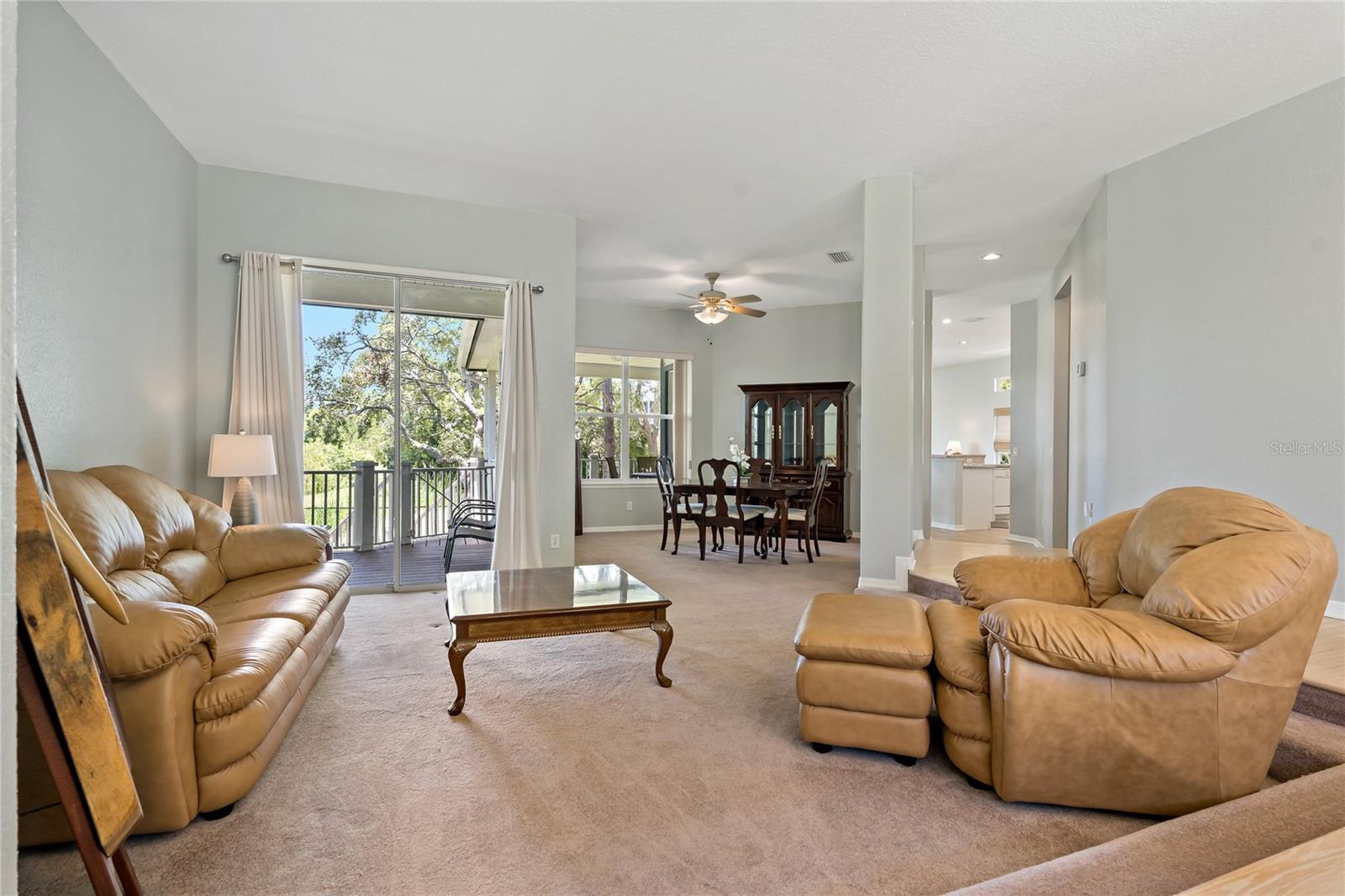 FROM THE ENTRANCE STEP DOWN INTO YOUR FORMAL LIVING ROOM AND DINING ROOM COMBO!