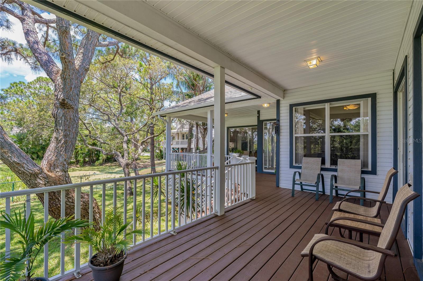 TAKE IN ALL OF NATURES BEAUTY WHILE RELAXING ON YOUR REAR, COVERED DECK!