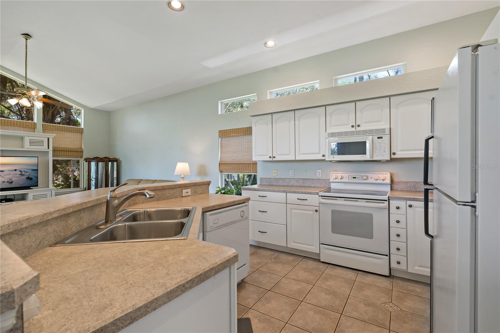 SPACIOUS KITCHEN OPENS TO THE FAMILY ROOM!