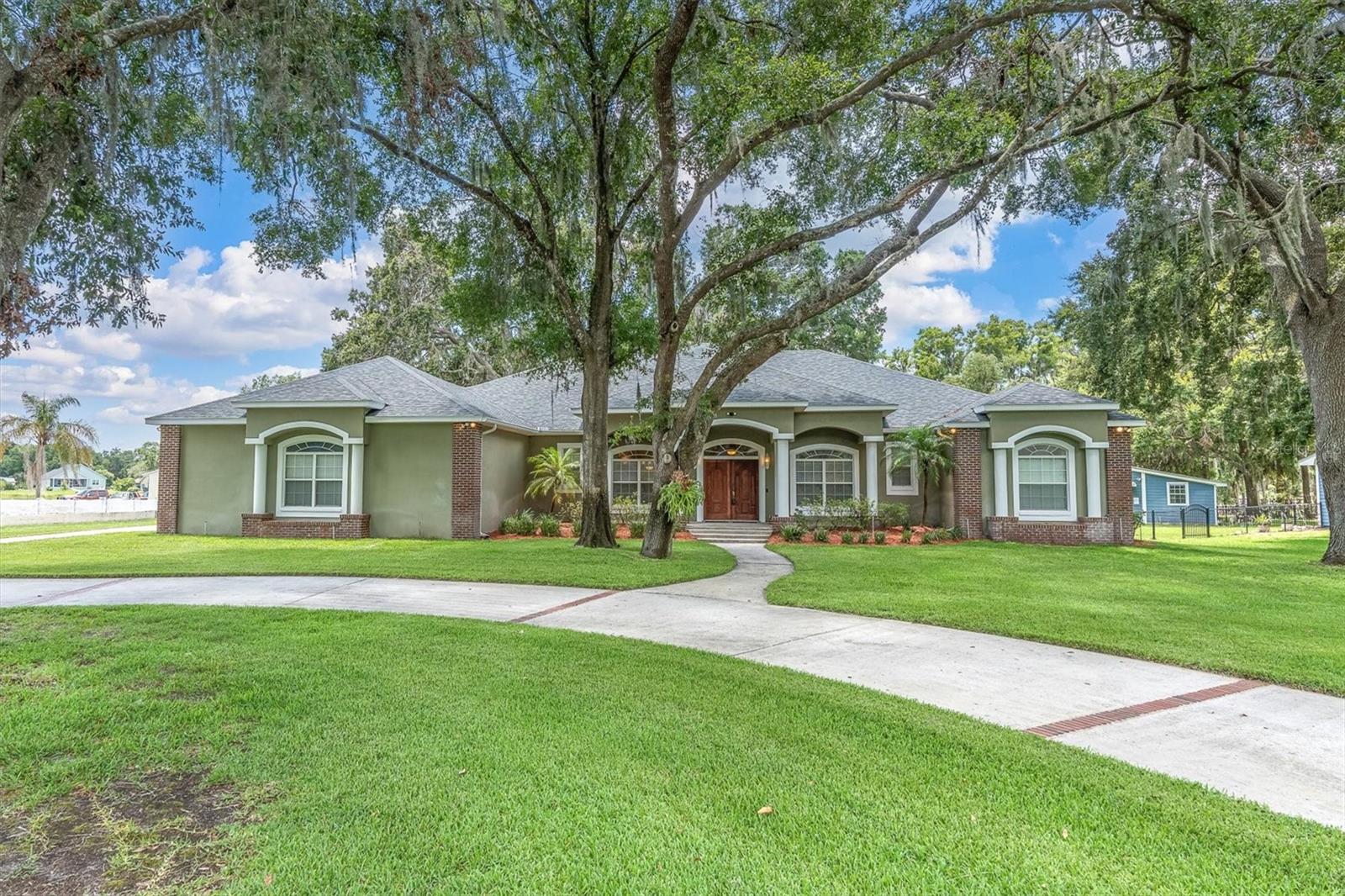 WELCOME HOME ~ A METICULOUSLY CARED FOR RANCH STYLE LAKE HOME ON SKI LAKE TAYLOR