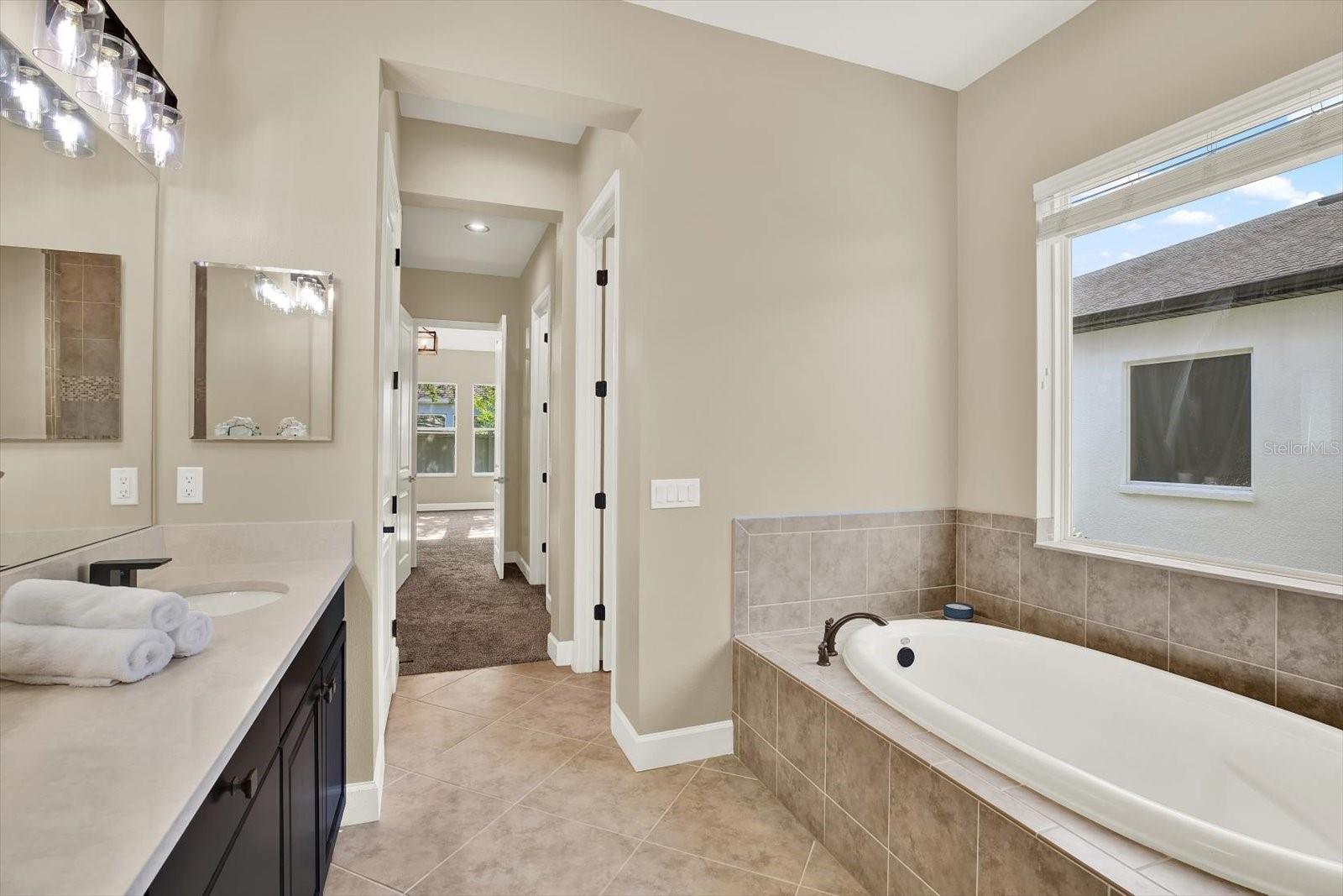 Deep soaking tub, private water closet