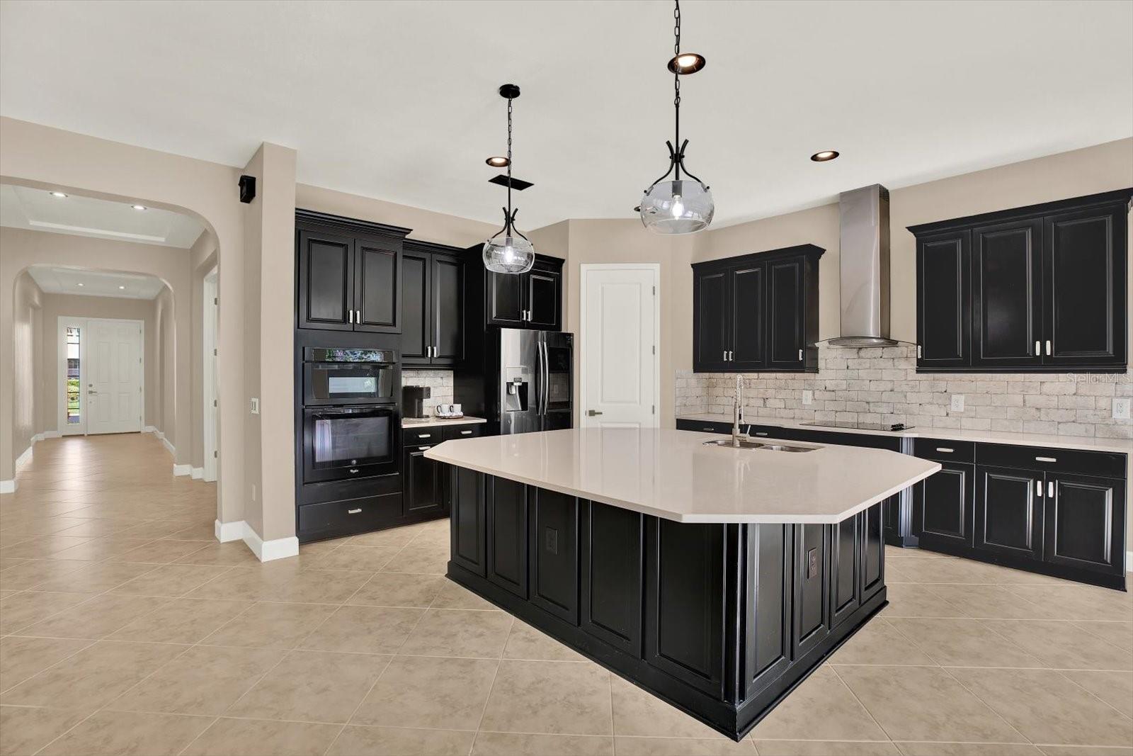 Spacious island can fit 4 to 5 barstools
