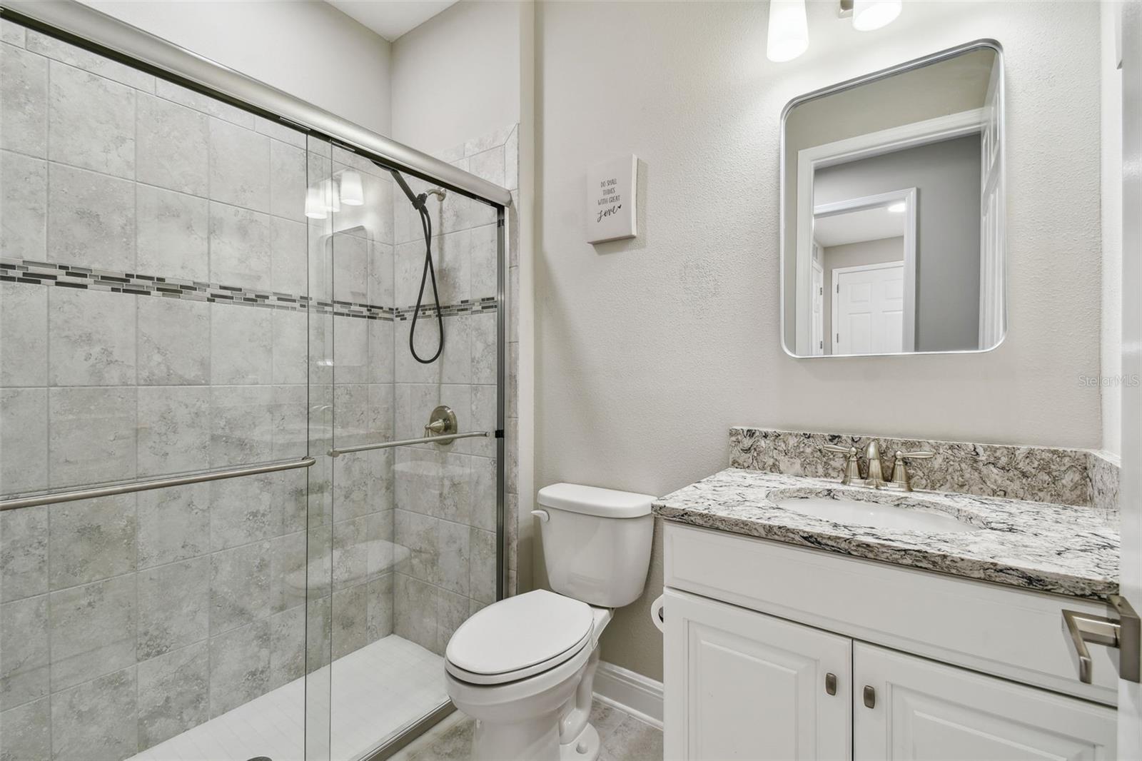 Additional THIRD FULL bathroom with shower
