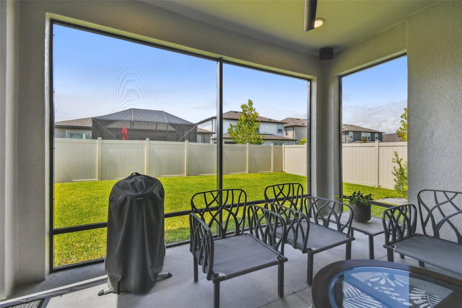 Extended and scrooned patio off the triple slider