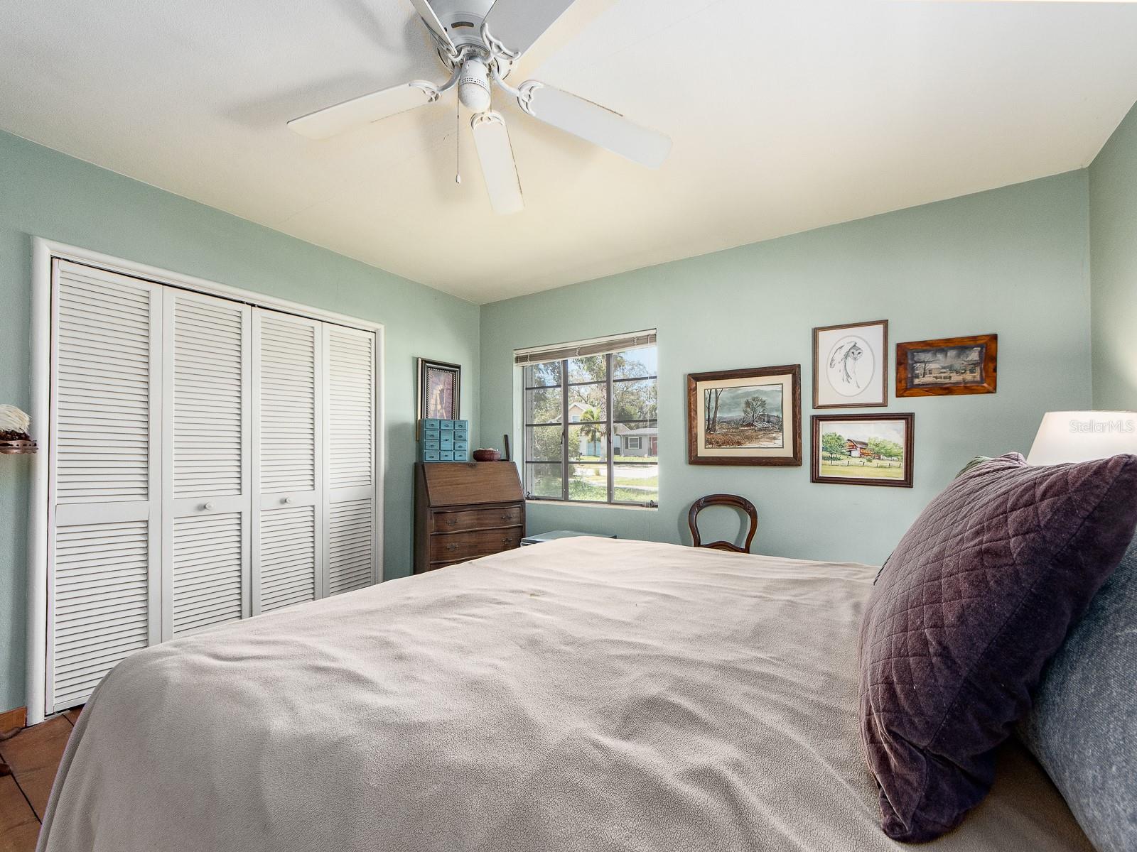 Walk in closet in primary bedroom