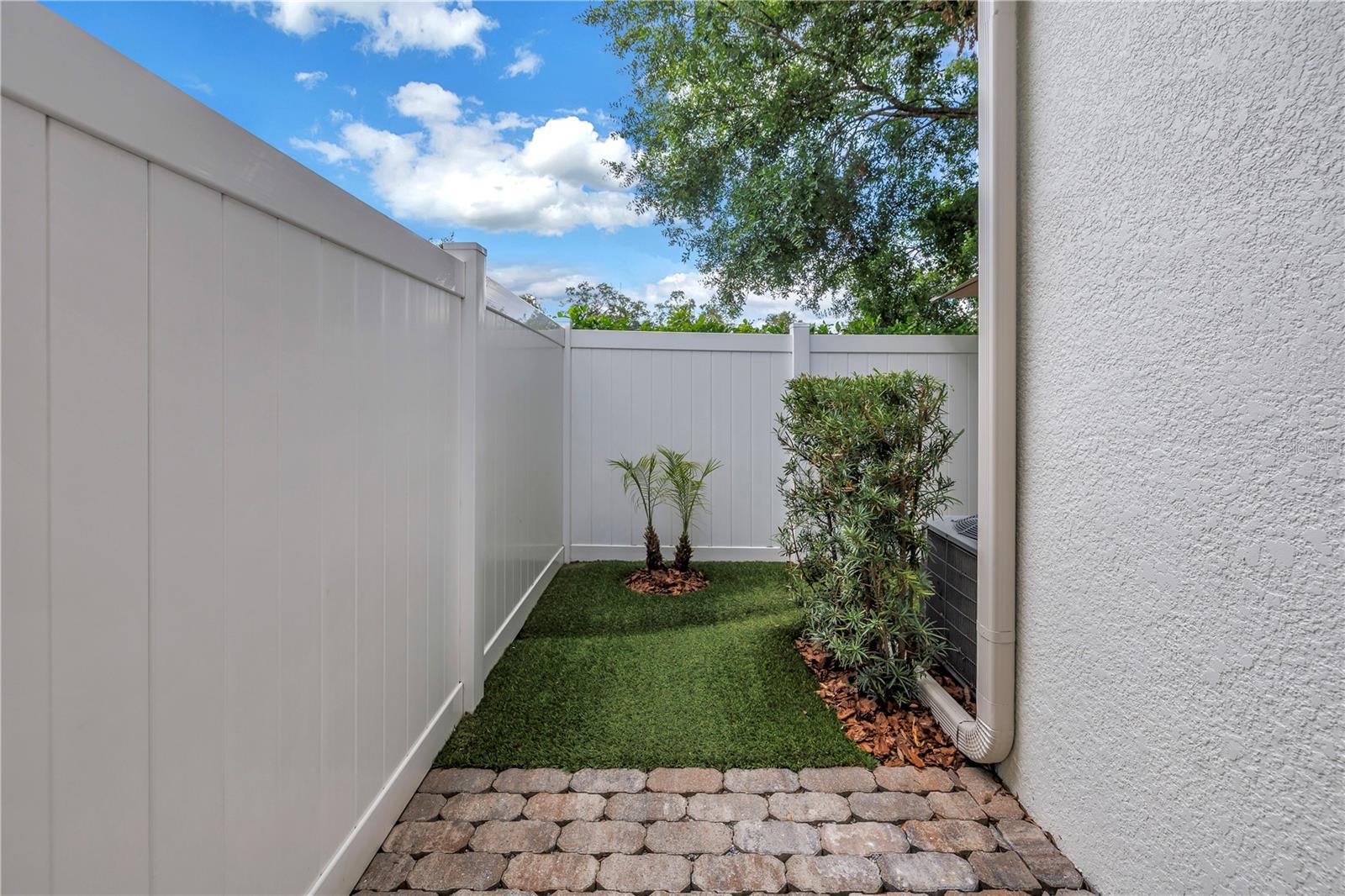 Pavers on Back Patio the Perfect Spot for a Grill