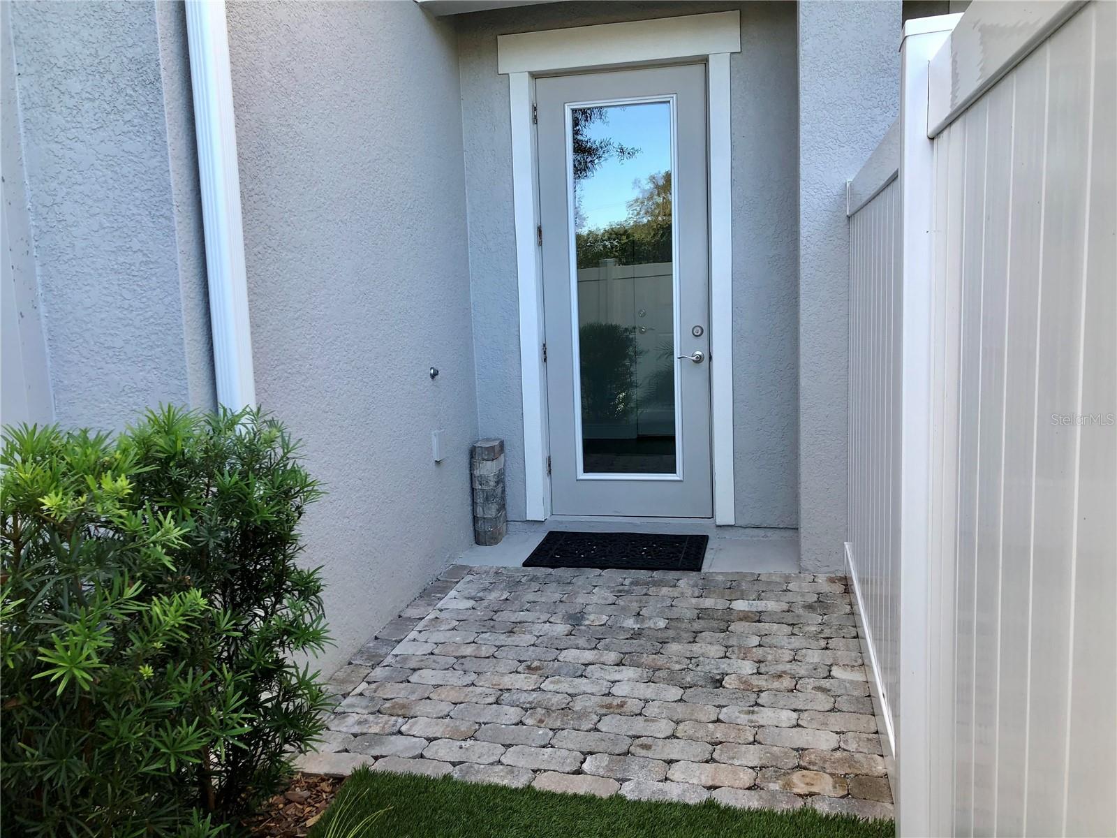 Natural Light in Foyer with the Back French Door