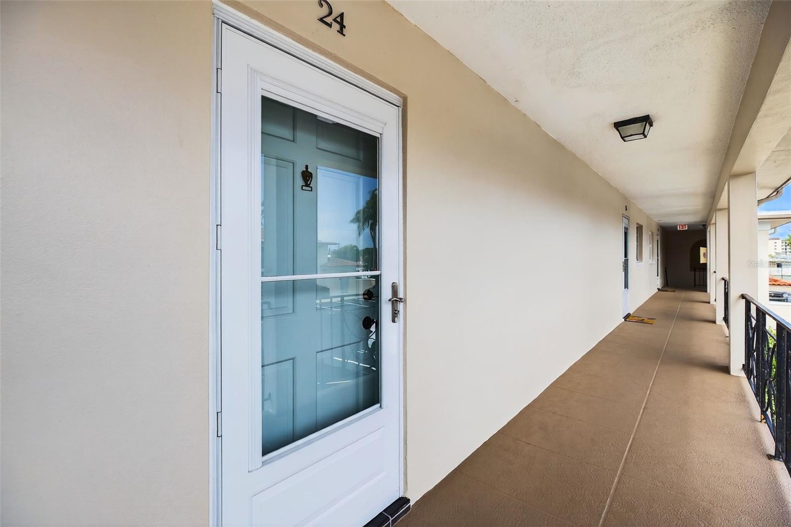 WELCOME to 10351 Regal Drive #24.   Brand new storm door so you can leave your front door open and capture the light!