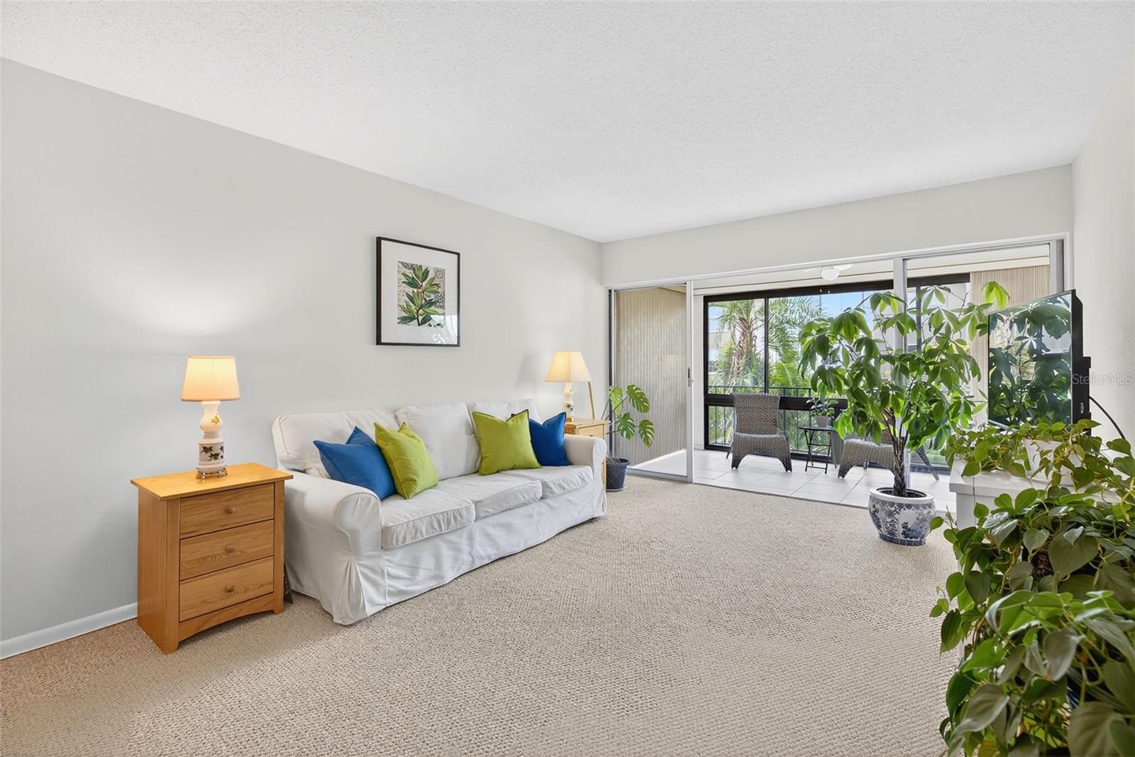Living Area open to Enclosed Patio.
