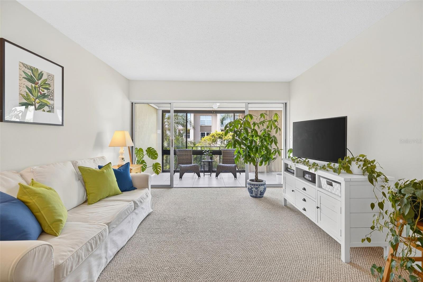 Living Area open to Enclosed Patio.