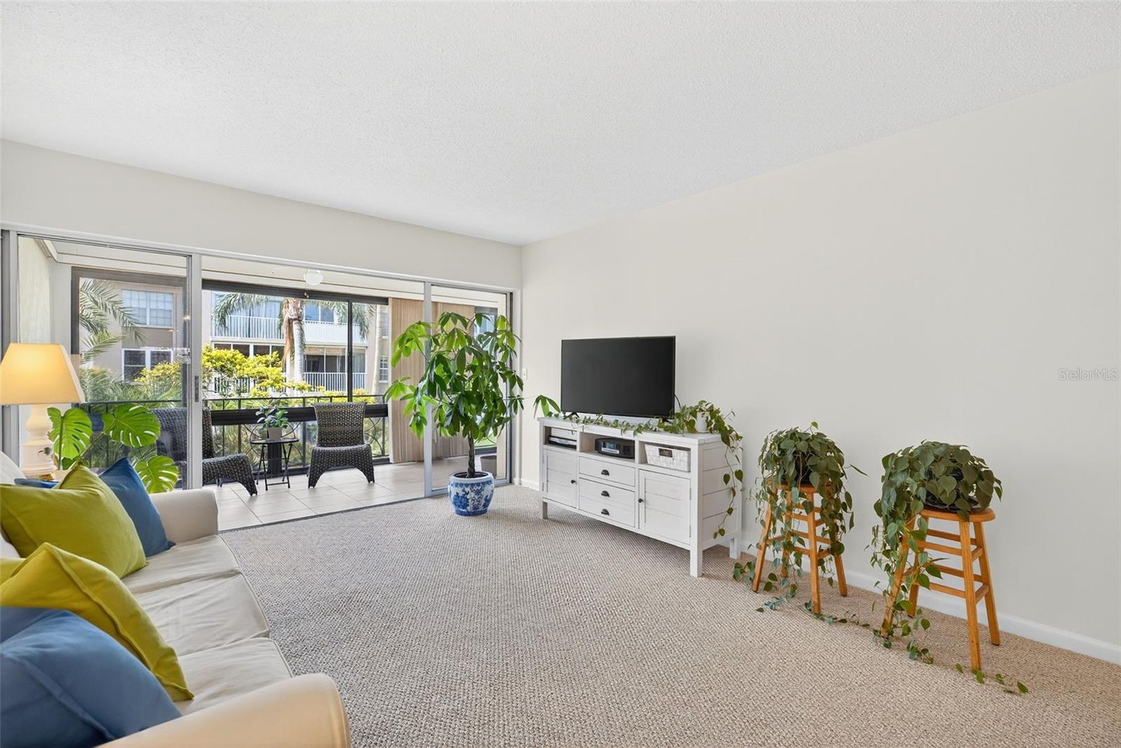 Living Area open to Enclosed Patio.