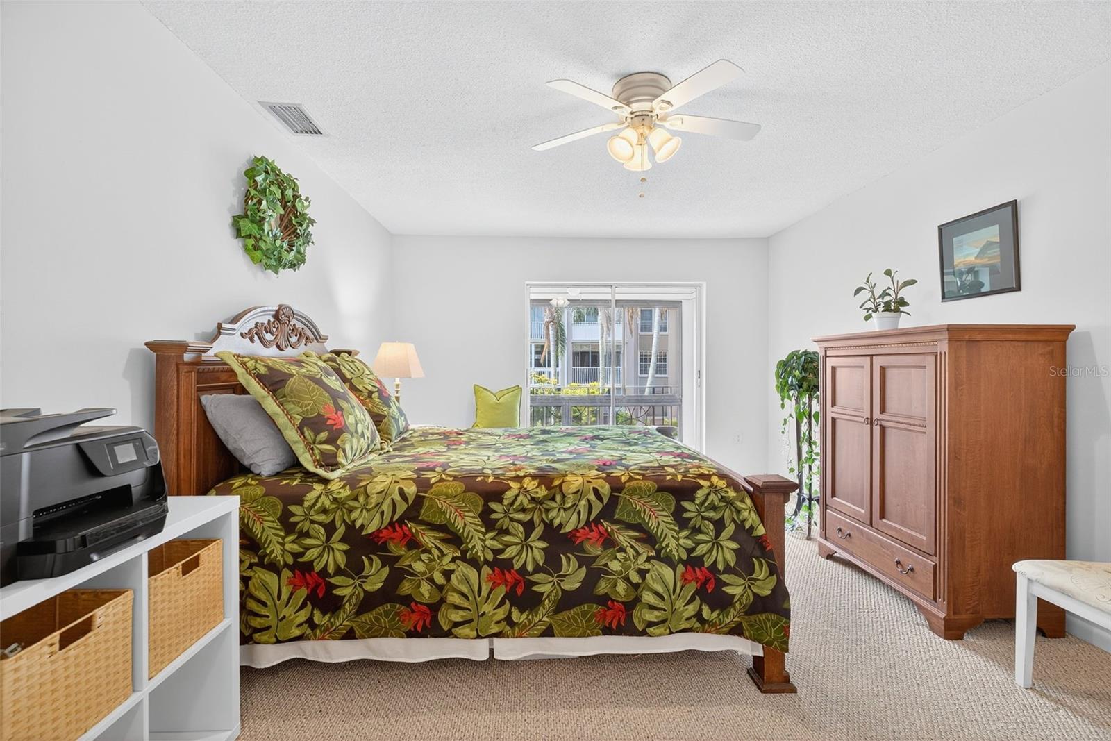 The bedroom could easily hold a king size bed, dresser and nighstands.  An abundance of natural light.