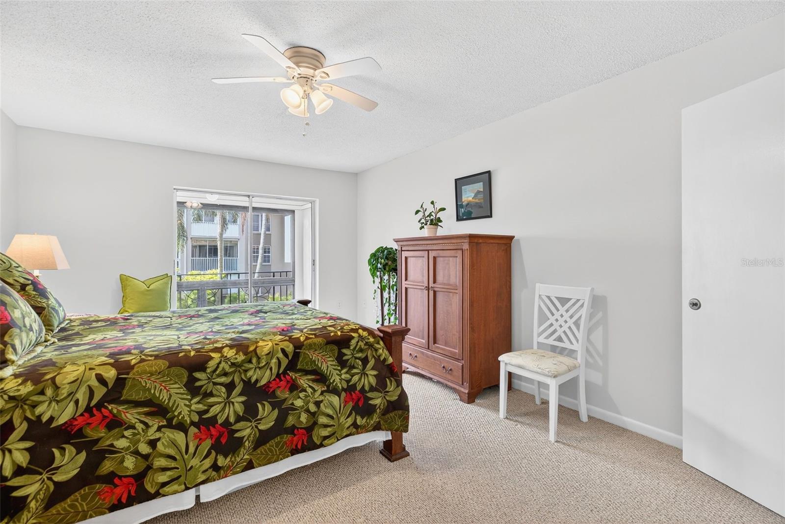 The bedroom could easily hold a king size bed, dresser and nighstands.  An abundance of natural light.