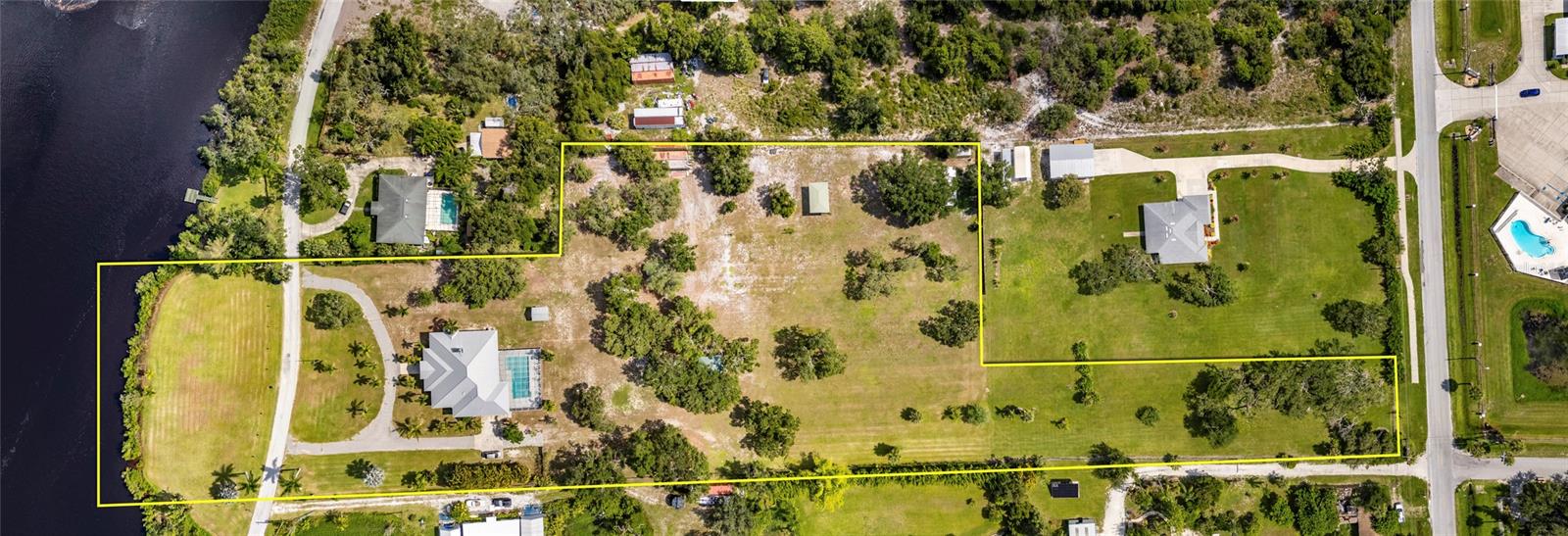 The 4+ acre property spans from the Little Manattee River to 7th St.