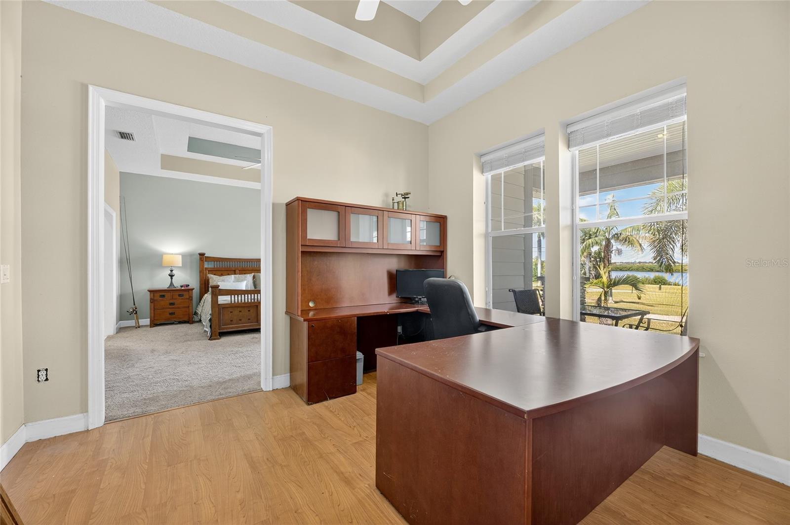Office with a waterfront view off the master suite.