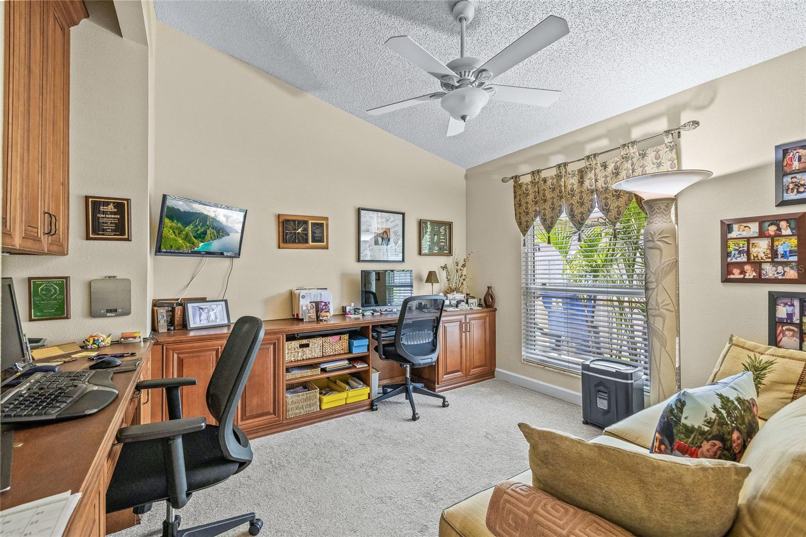 Currently used as an office with beautiful built-ins, the guest bedroom can easily convert back to a bedroom.