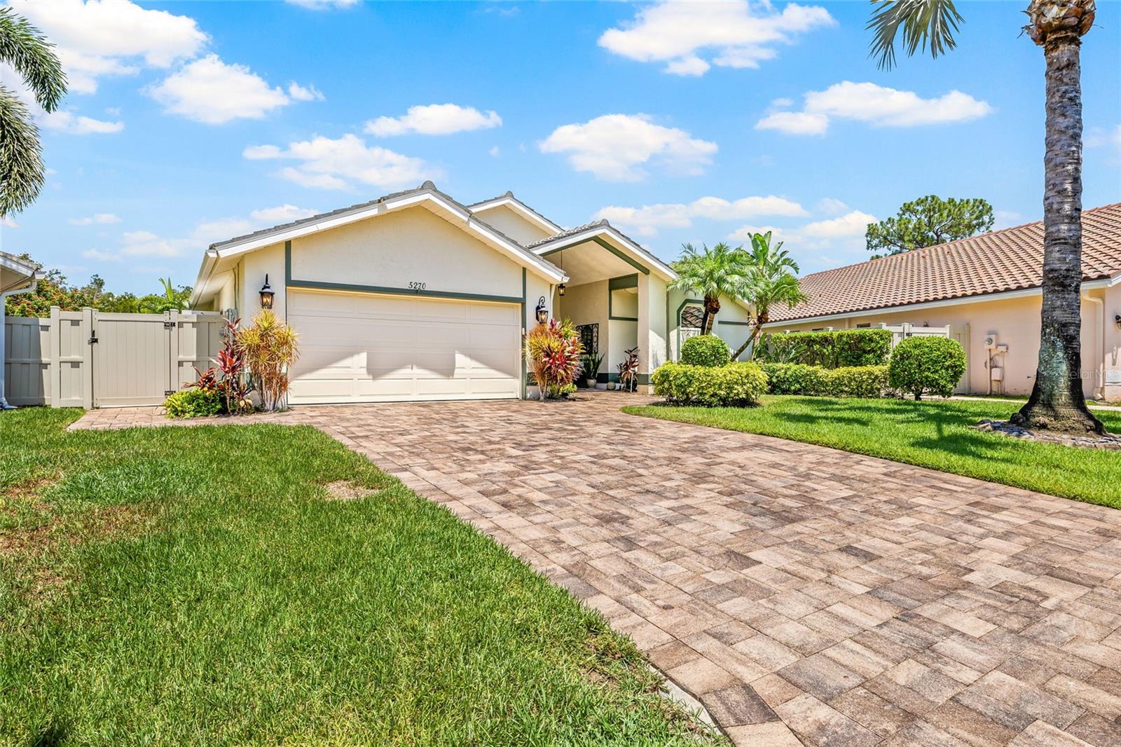 Gorgeous artisan pavers lead you home.