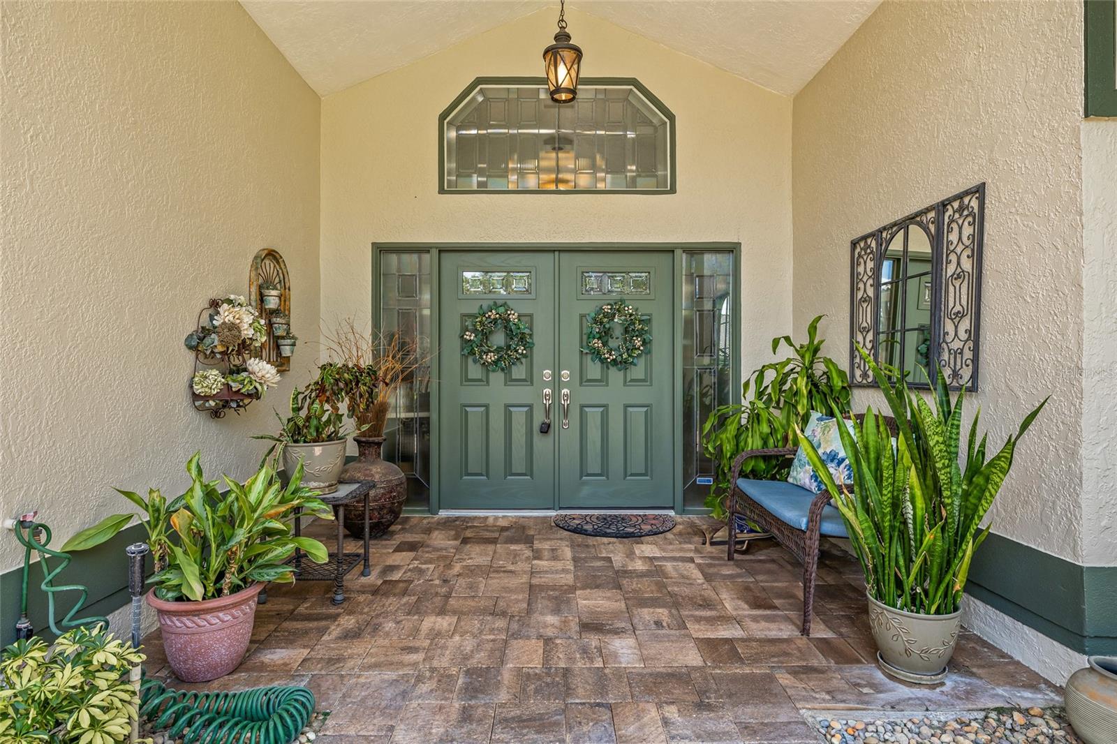 Massive entryway highlighted by grand double doors