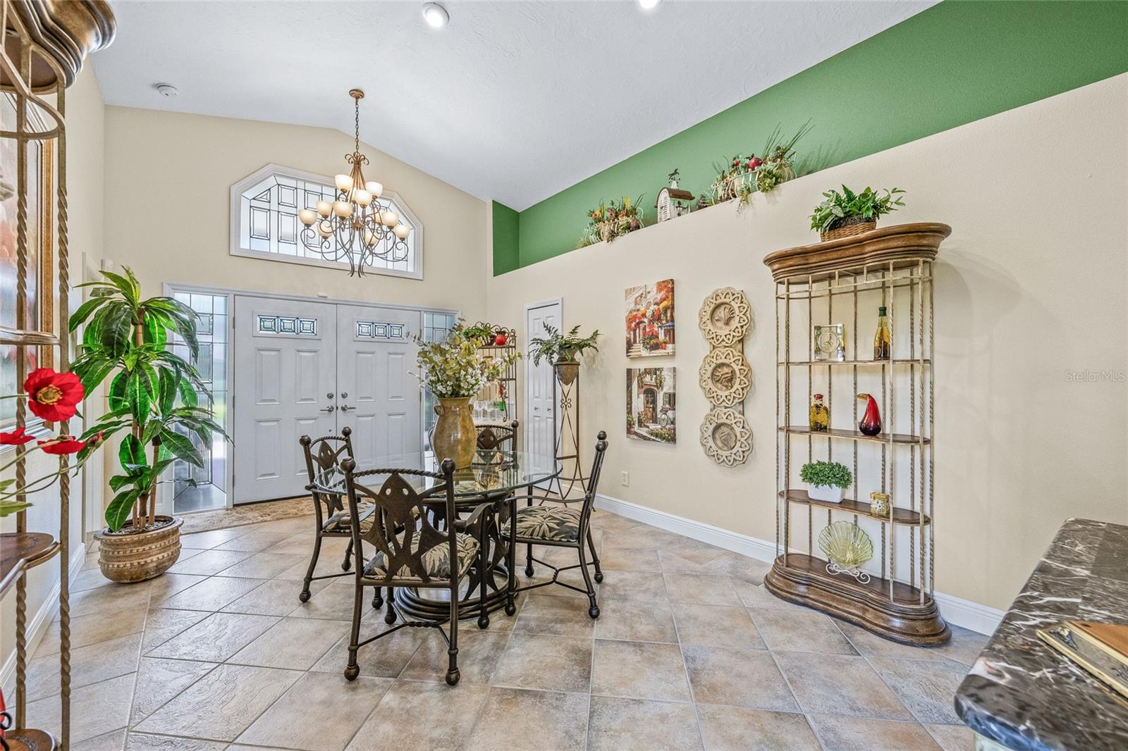 Enter the front doors to the large foyer...perfect for a dining room, seconday TV room, playroom and more.