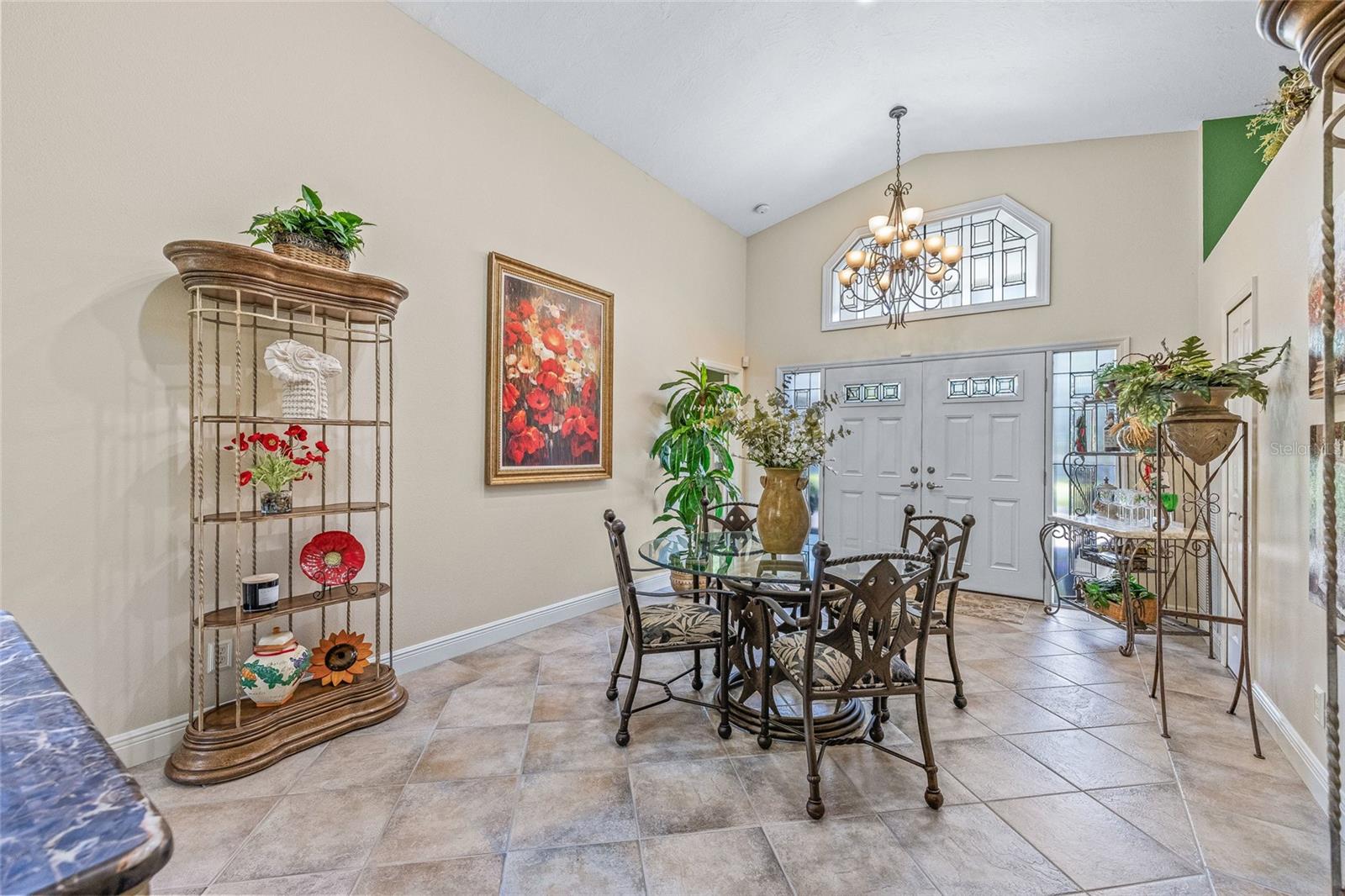 The foyer is spacious and versatile—ready to accommodate your unique vision.