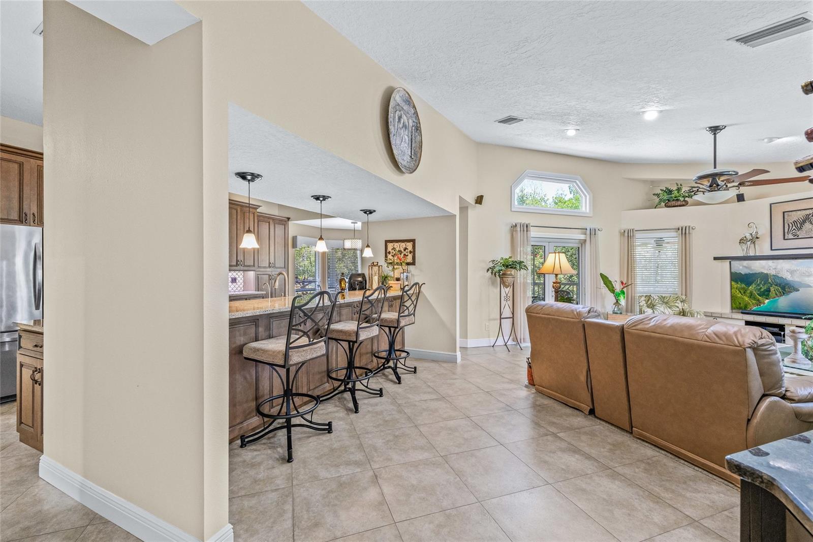 Free-flowing kitchen and living room.