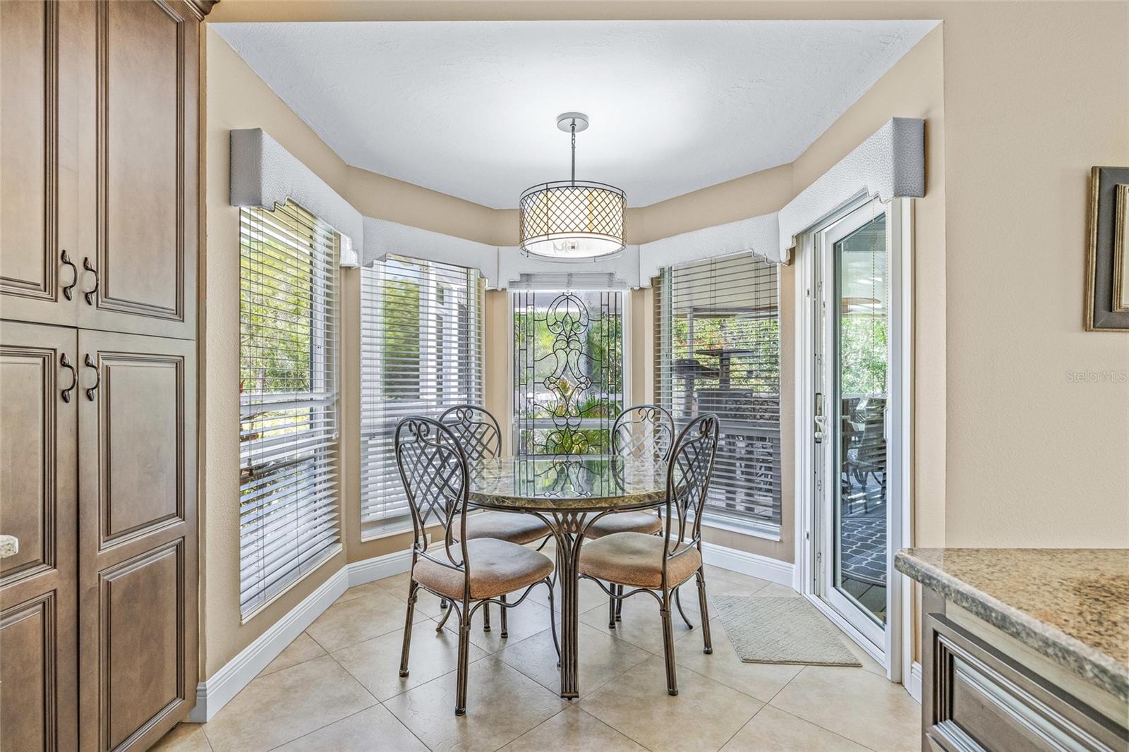Eat-in kitchen with stunning views overlooking the preserve.