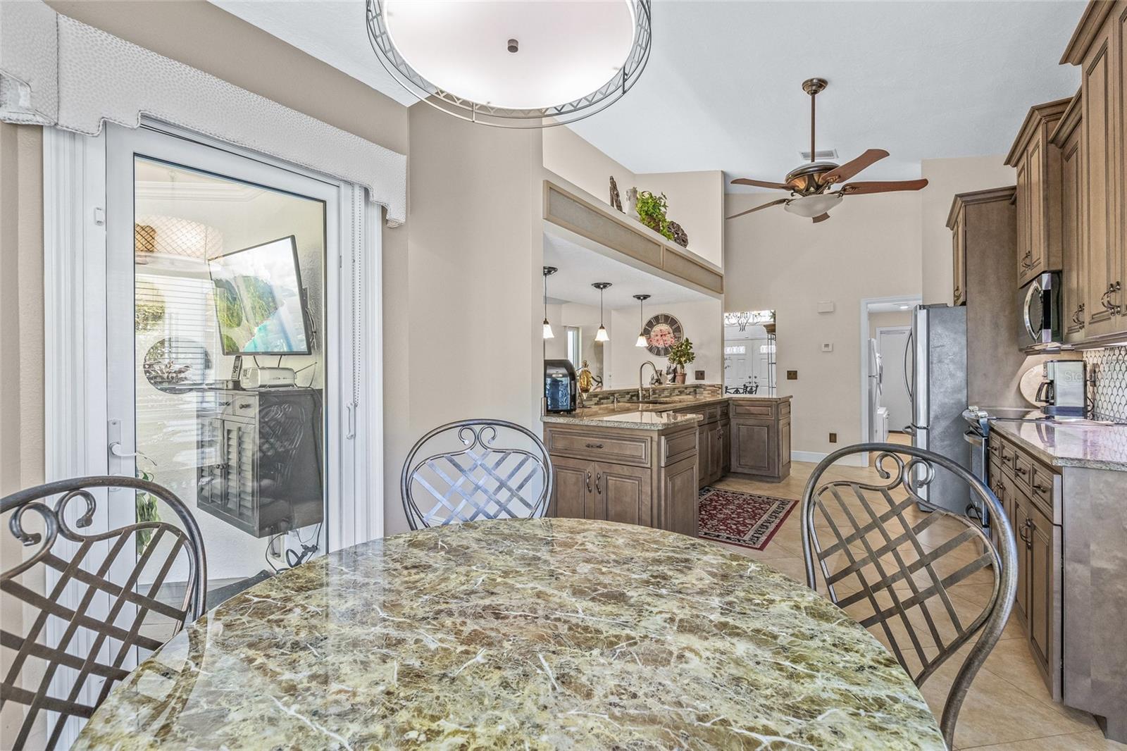 Dinette leading to the outdoor porch.