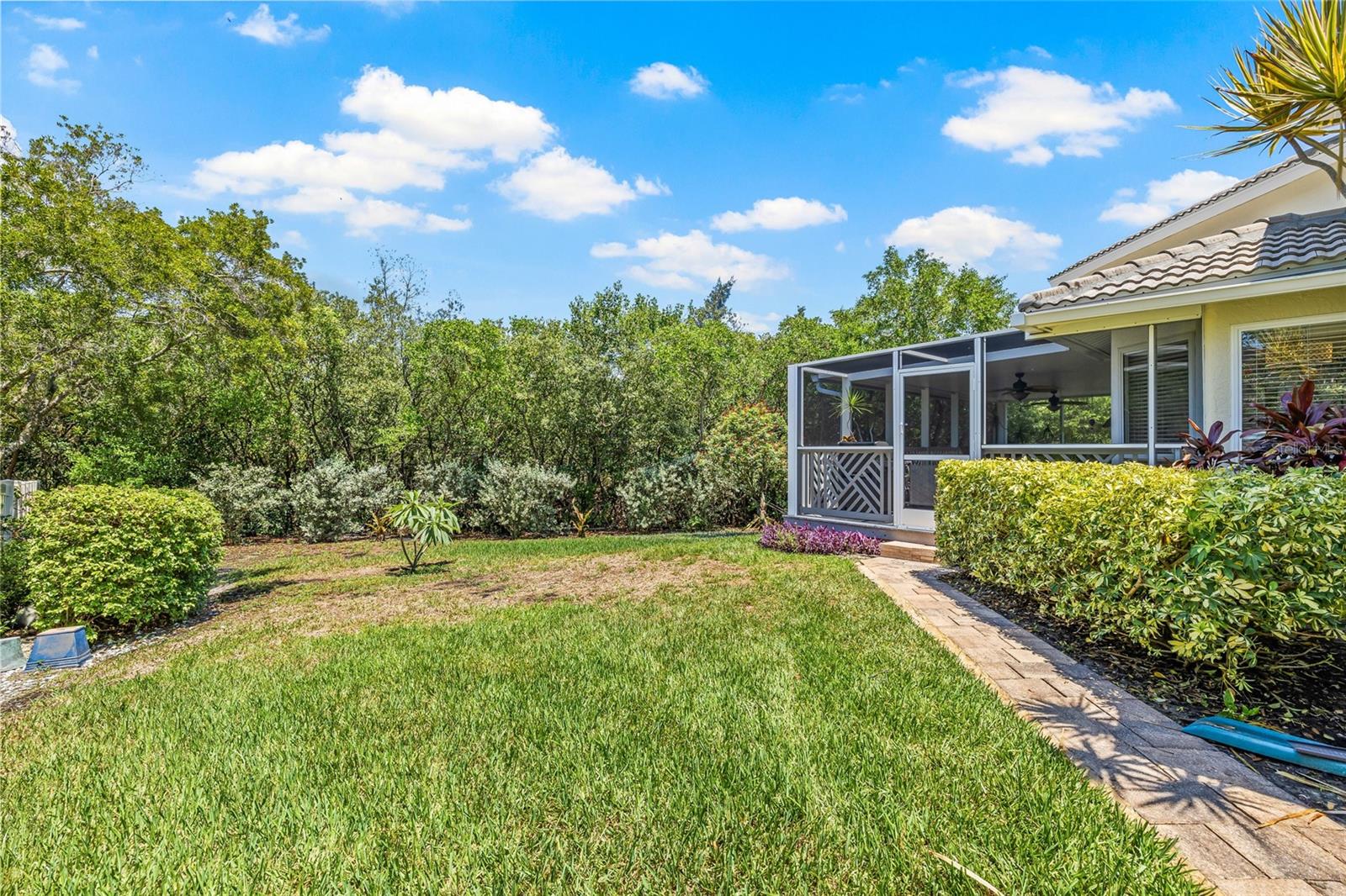 Relax on the porch with the peaceful wildlife preserve as your backdrop.