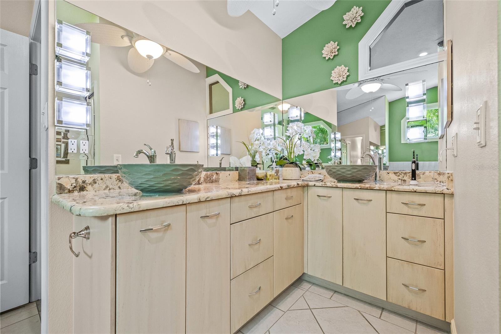 Enjoy the luxurious double vessel sinks in the primary ensuite.