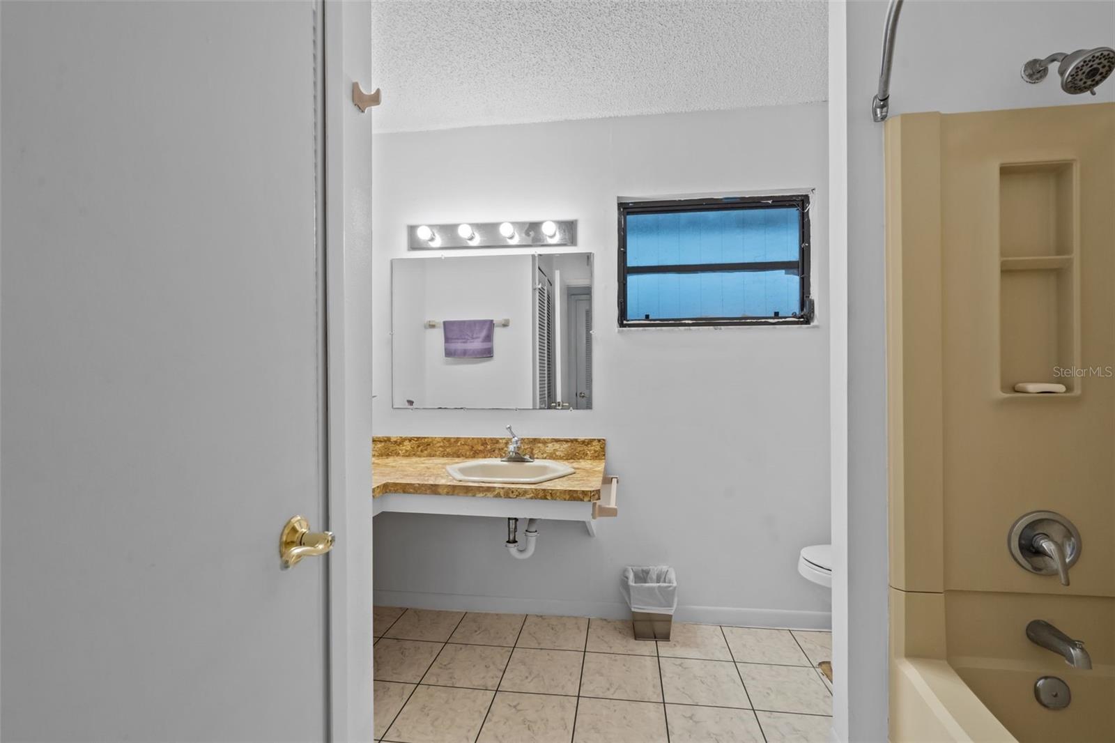 Bathroom across from 2nd bedroom