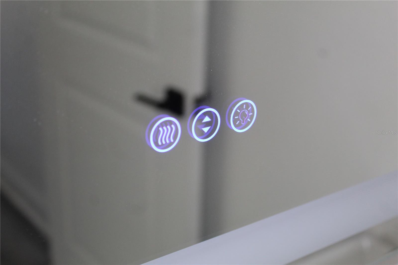 Heated Mirrors in all bathrooms with built in lighting.