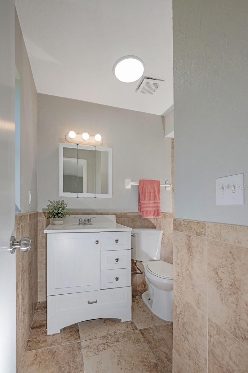 Primary Bathroom has a 3ft Tile Half Wall