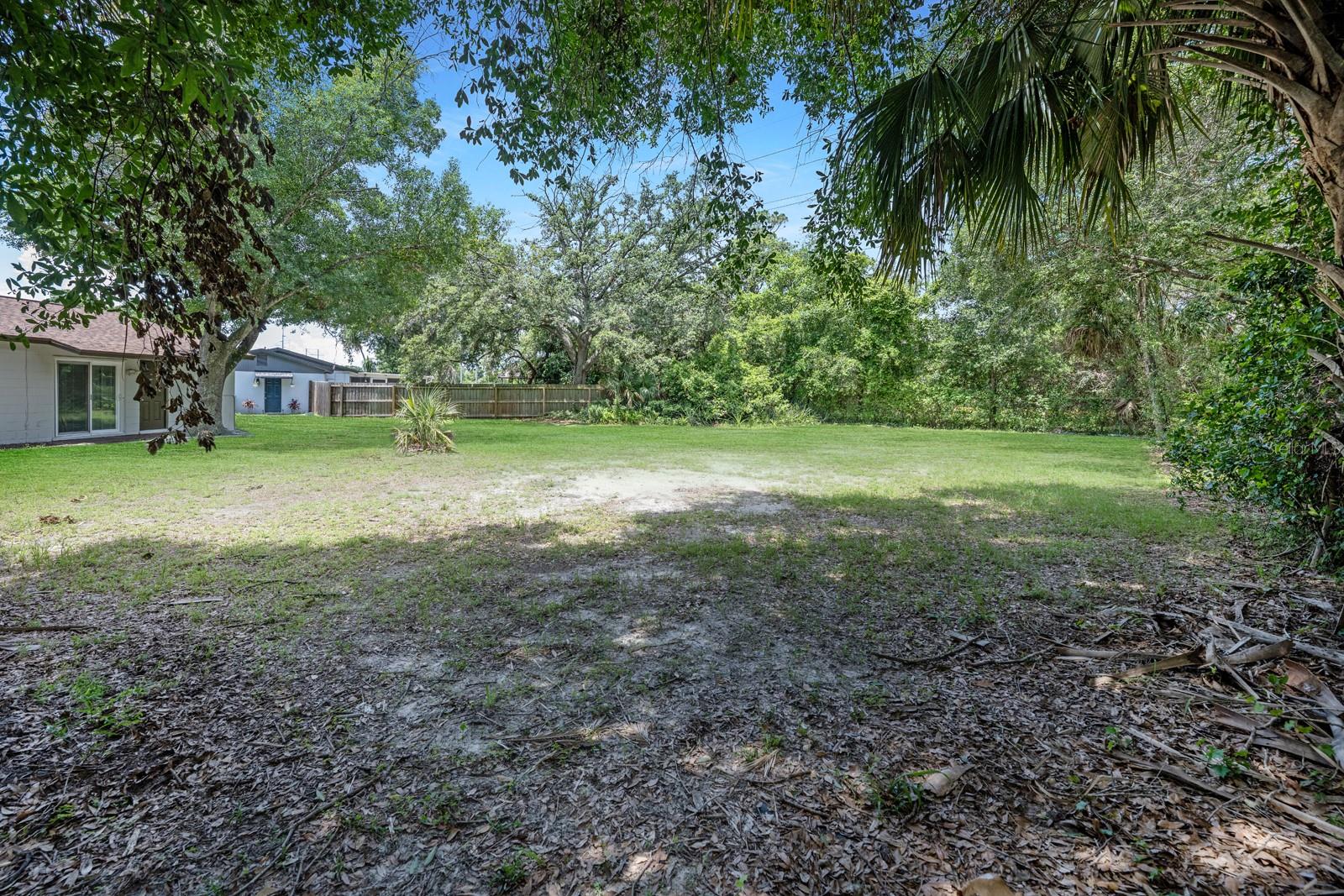 Partially Fenced-in Backyard Area