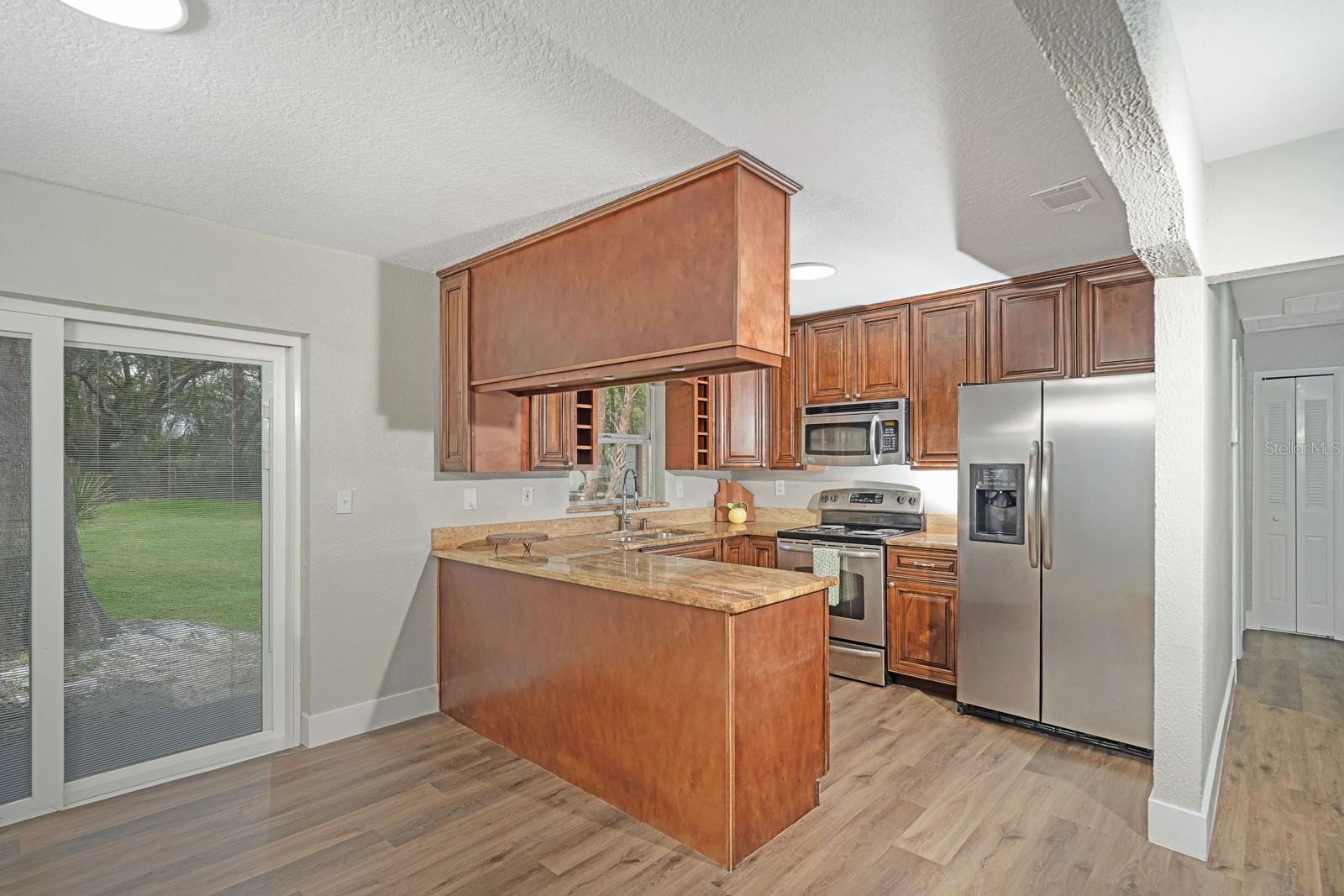 Newer Sliding Glass Door and Breakfast Bar