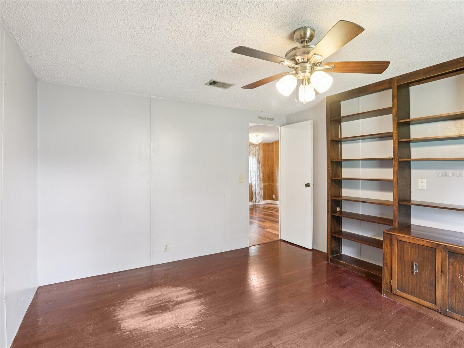 3rd bedroom from inside room facing entry door going back out into hallway