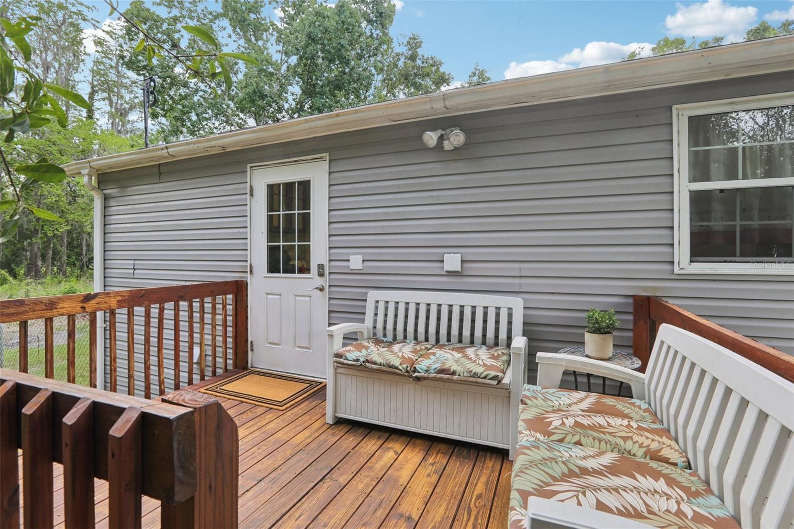 Back porch facing entry door