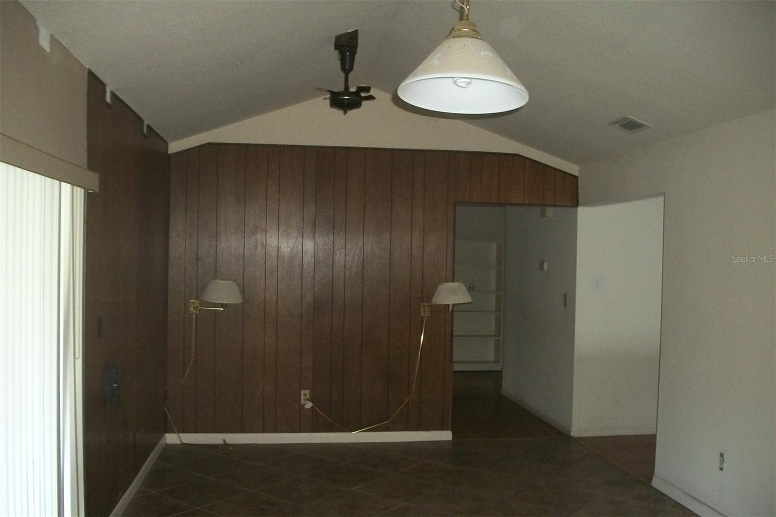 Standing in kitchen looking into family room