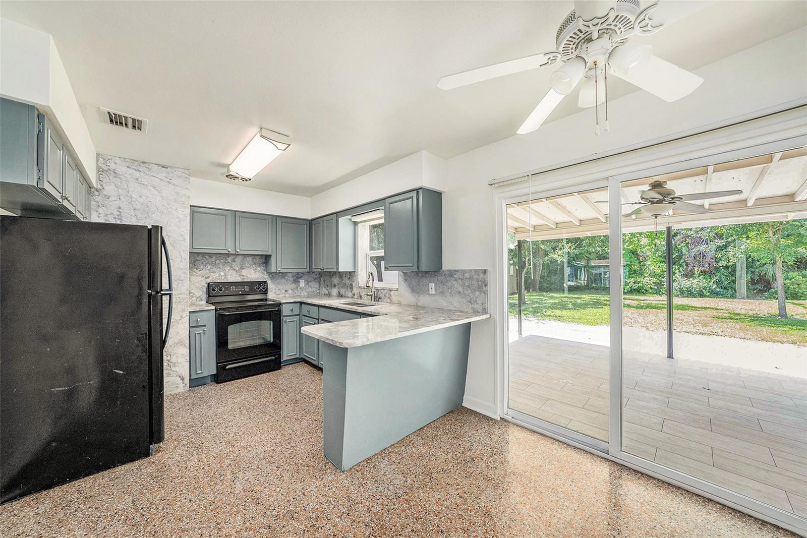 View of dining area and kitchen when you enter from the carport door