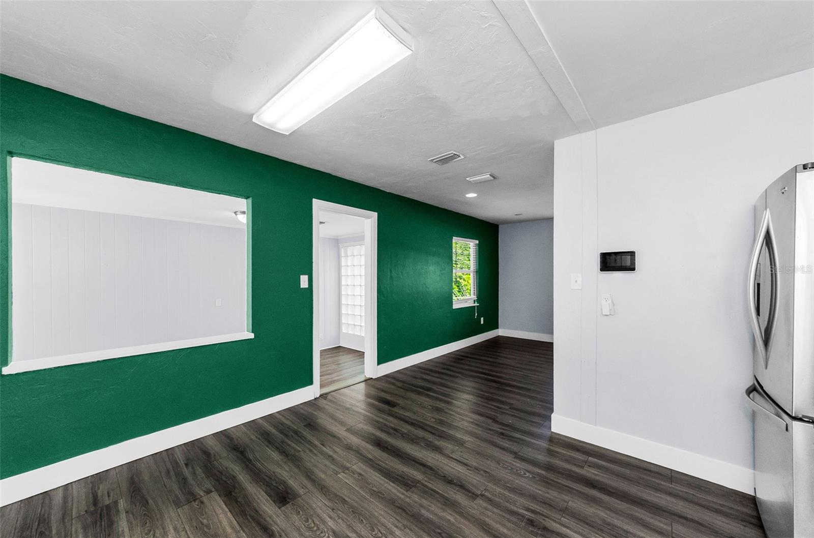 Kitchen opens to Bonus Room and Living Room