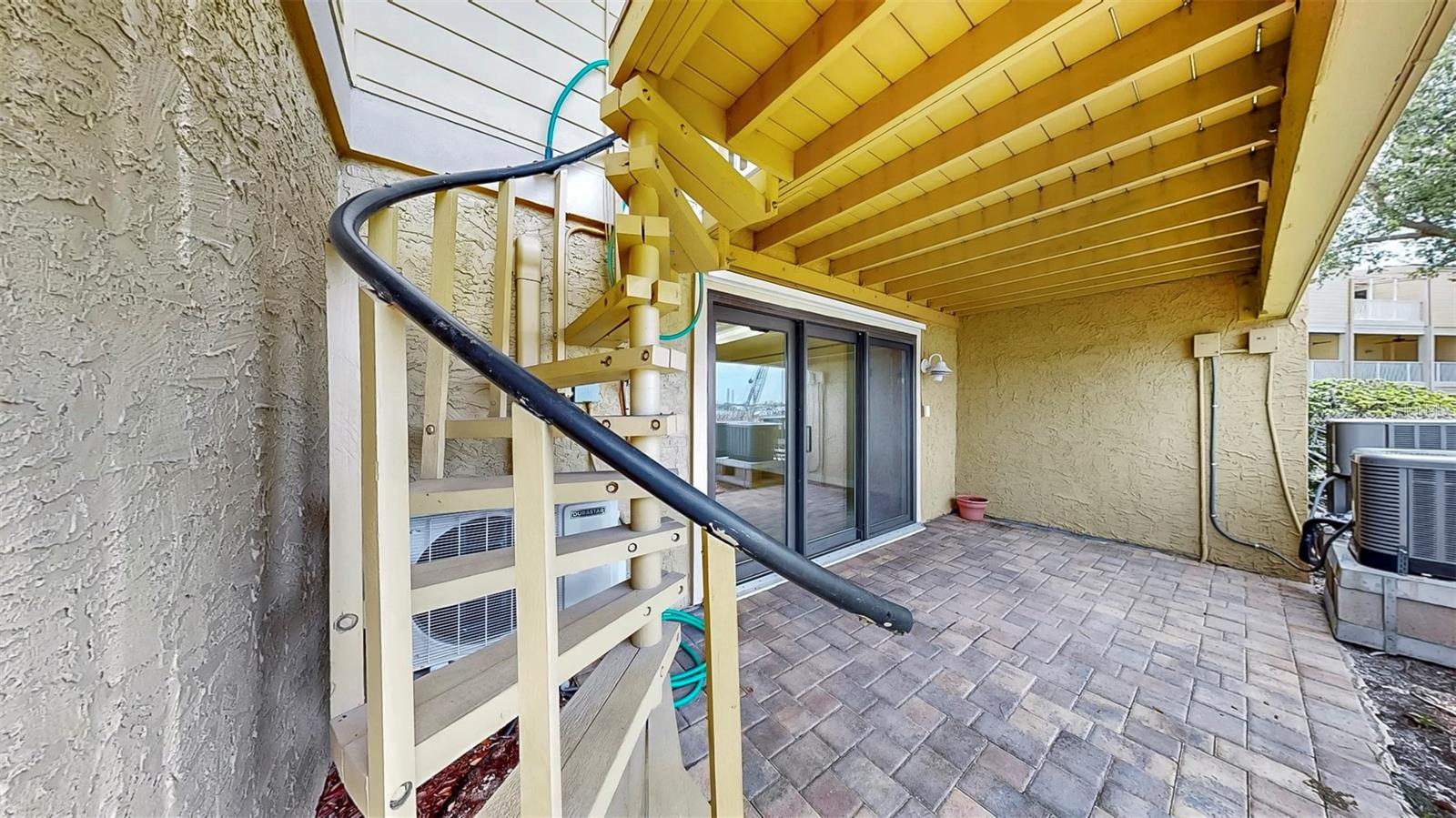 Ground Floor Spiral Staircase to 2nd Floor Balcony