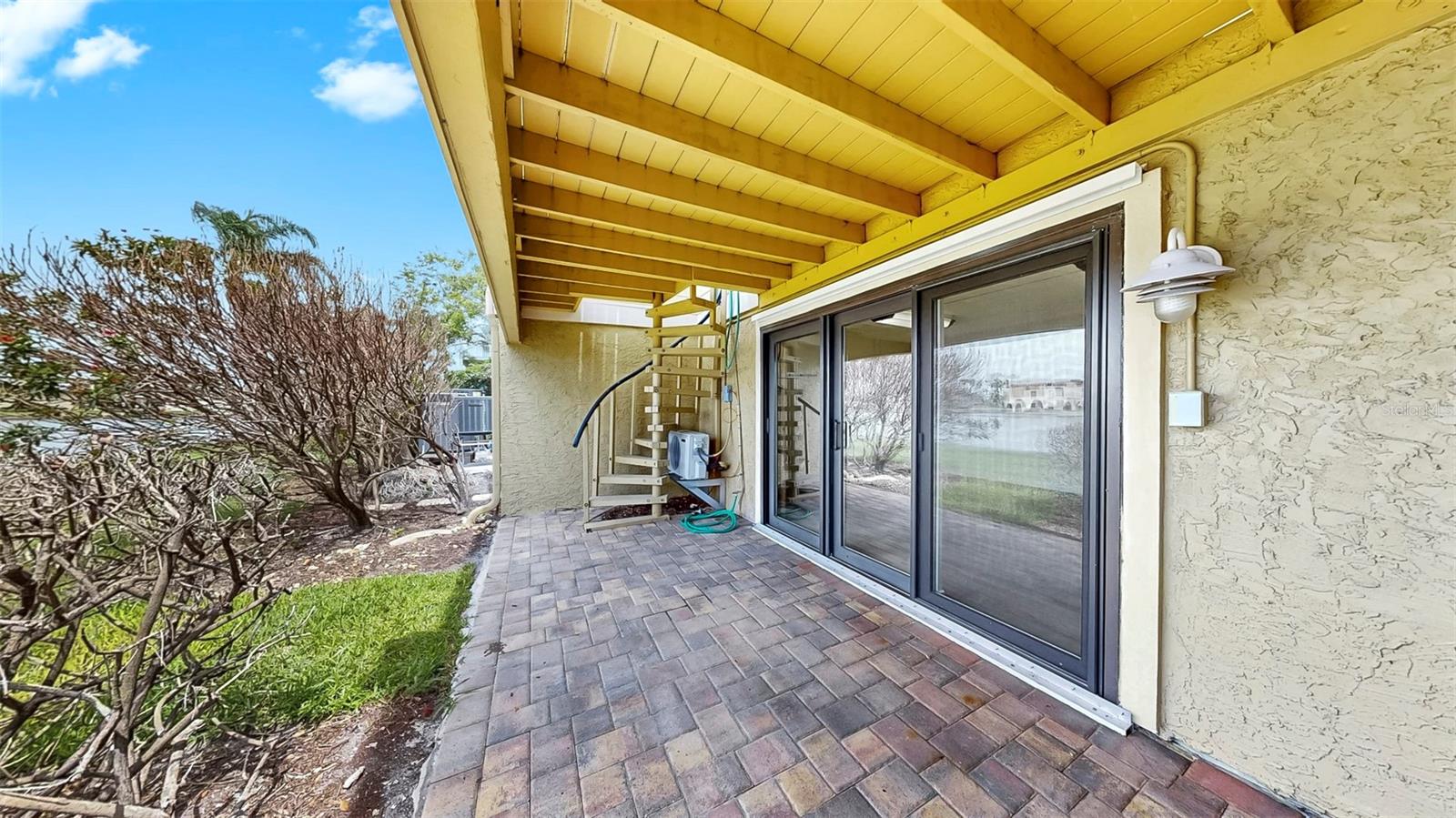 Ground Floor Covered Lanai - Sliders to Bonus Room